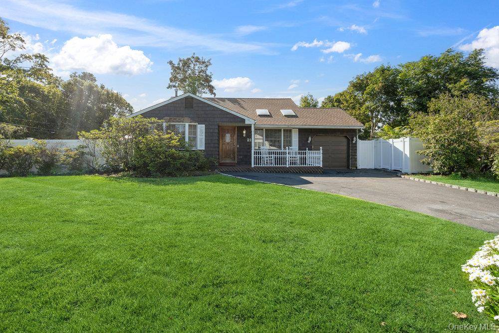 Welcome to this charming home nestled on a beautifully landscaped corner lot at 21 Larry Road, Selden, NY !