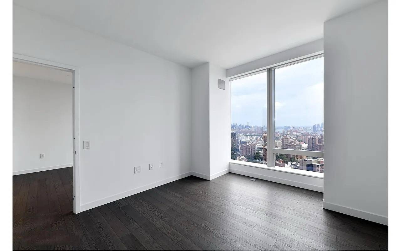 695 Square foot one Bedroom, one bathroom with an open gourmet kitchen and breakfast bar.
