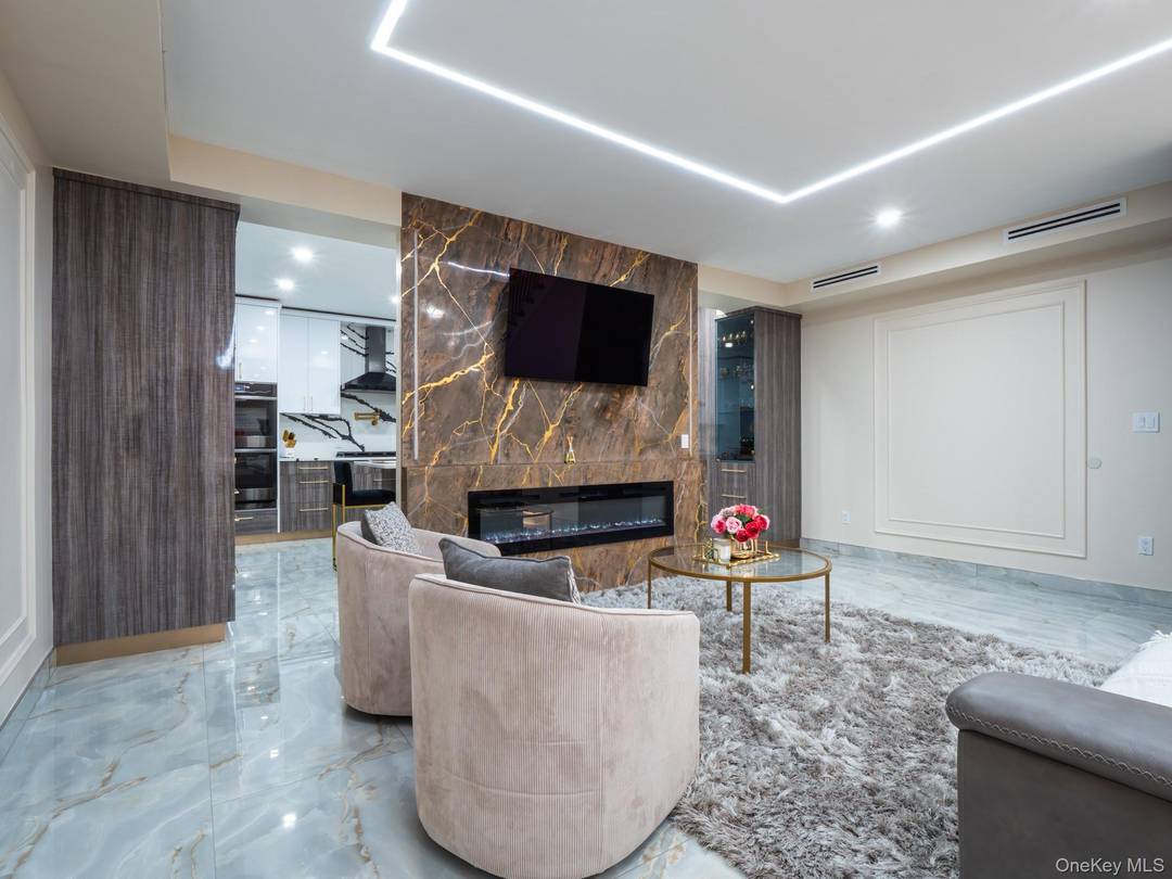 Brand new luxury construction in the heart of Forest Hills showcases a perfect blend of modern architecture, high end finishes, and thoughtful design.