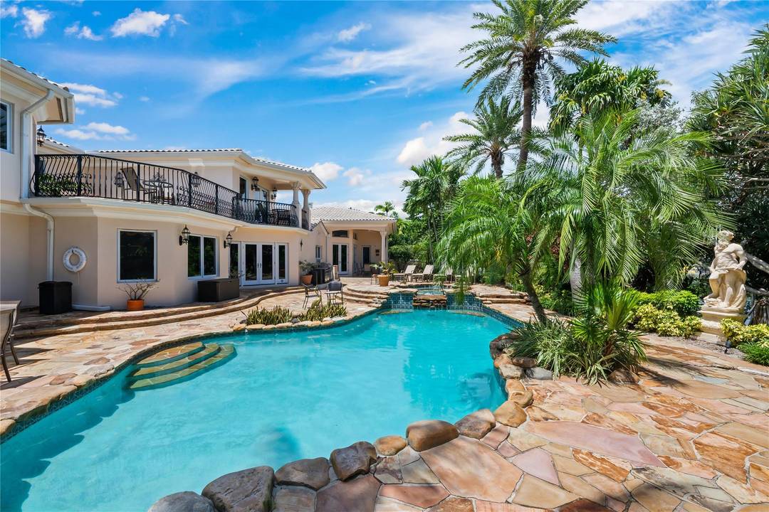 Private Estate with 130' fronting Lake Mayan, in the exclusive Harbor Beach neighborhood in Fort Lauderdale.