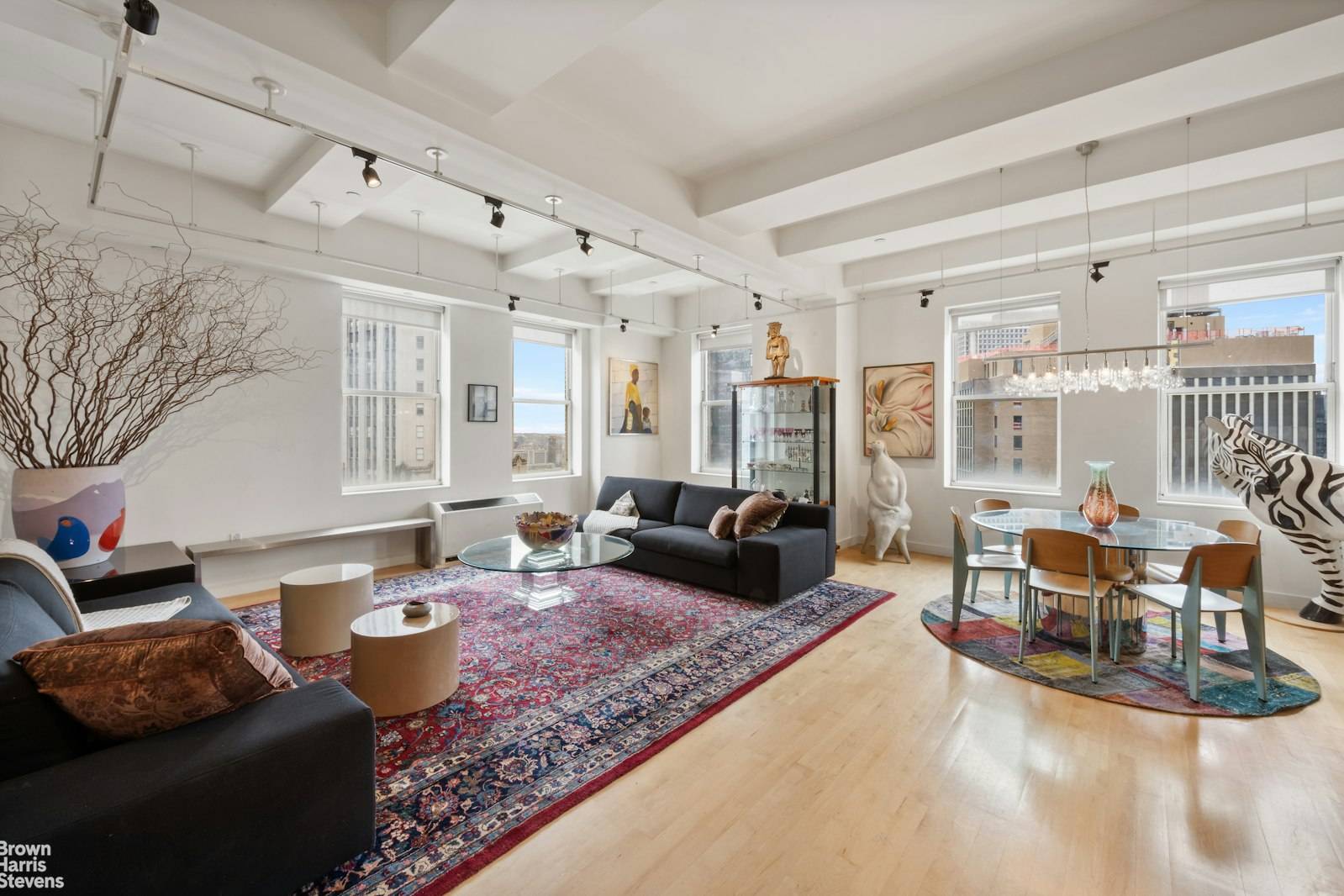 Overview Discover the ultimate in sophisticated urban living in this exceptional art collector'sloft home in the vibrant Financial District.