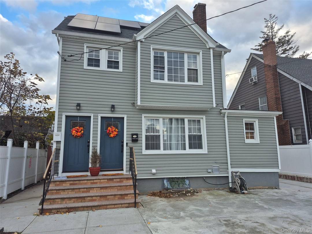 Welcome to 190 18 114th Drive, a newly renovated 3 bedroom, 1 bathroom duplex nestled on a quiet, tree lined street in the heart of St.