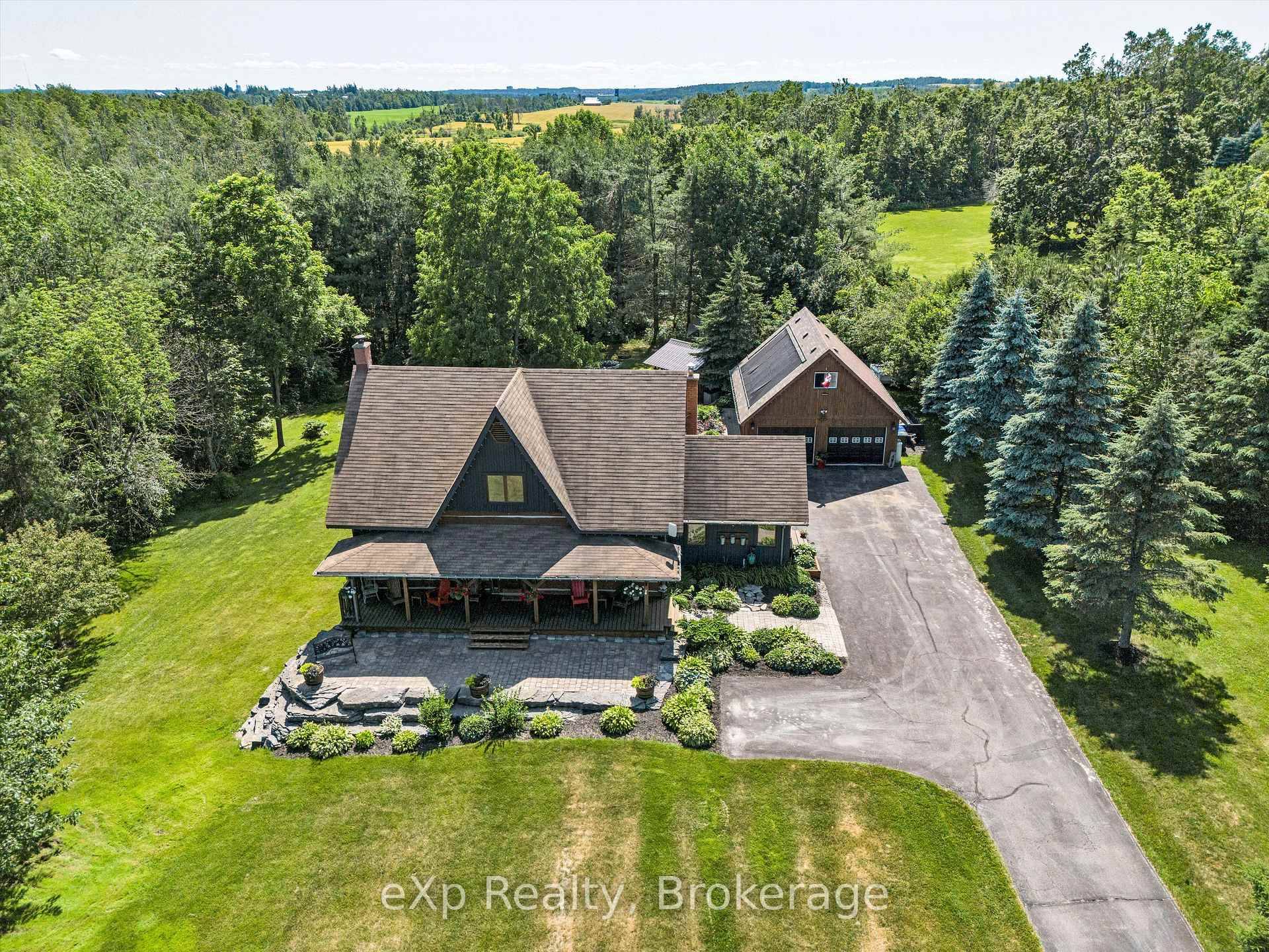 Welcome to this one of a kind, Hutley built custom log home, nestled on a serene and park like country lot just minutes from Shanty Bay and Heritage Hills Golf ...