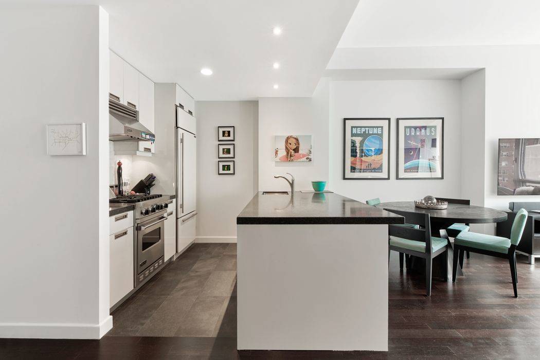 Situated on the eight floor of The Onyx Chelsea this bright south facing one bedroom home features a 10' ceiling with floor to ceiling windows and designer Wenge hardwood floors.