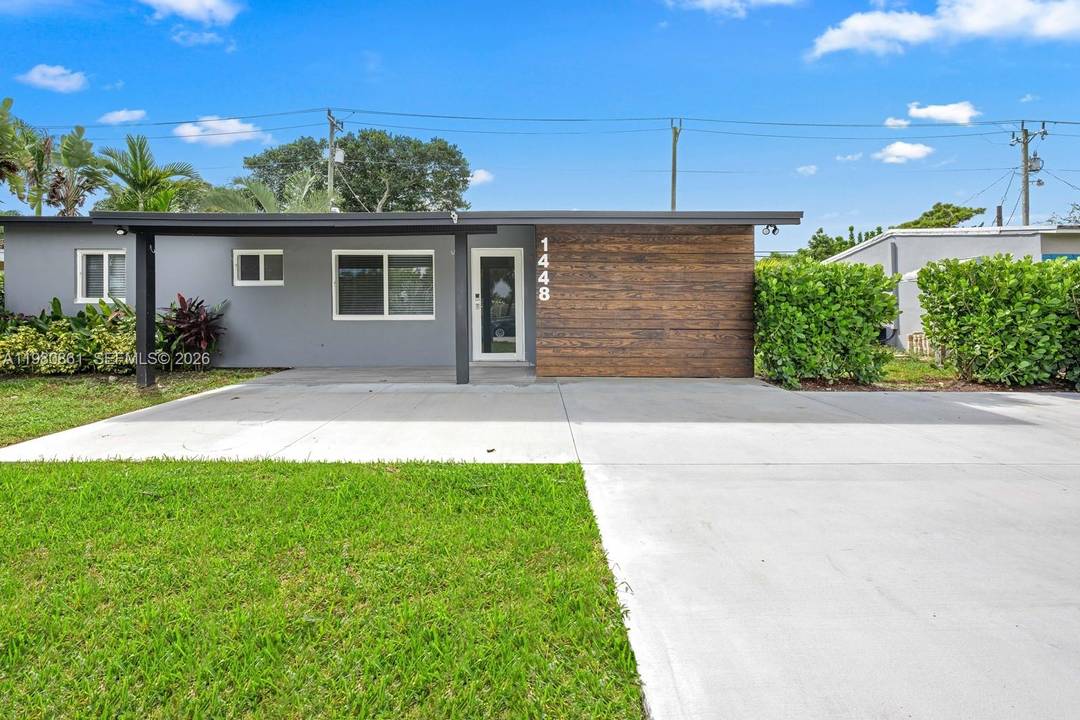 Fully renovated 4 bedroom, 2 bath single family home in Pompano Beach featuring tile flooring throughout, updated kitchen and baths, and impact windows and doors.