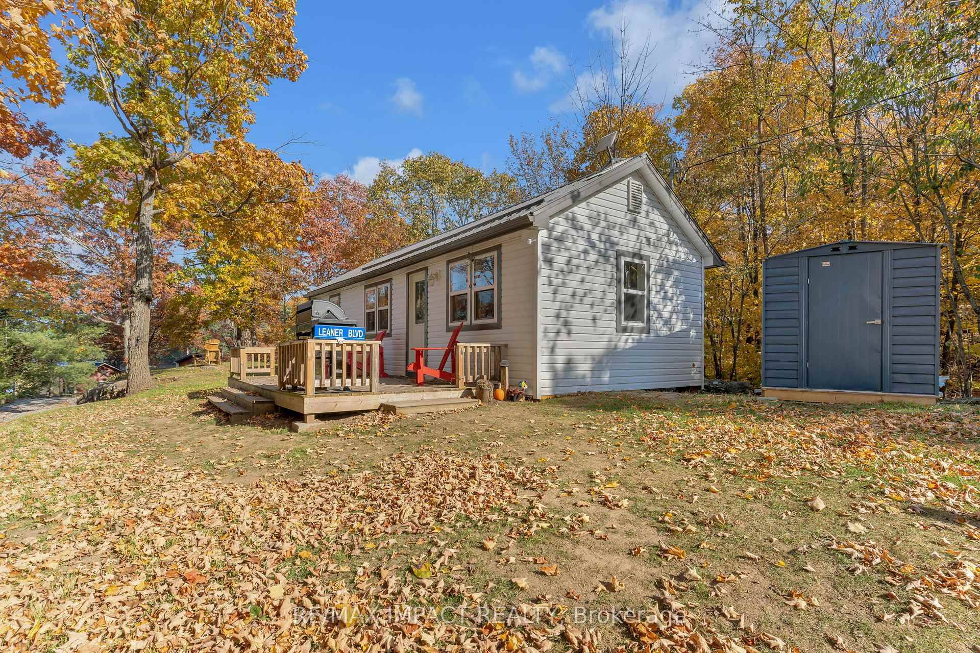 Escape to your own private point surrounded by water at this spectacular, recently renovated lakefront property.