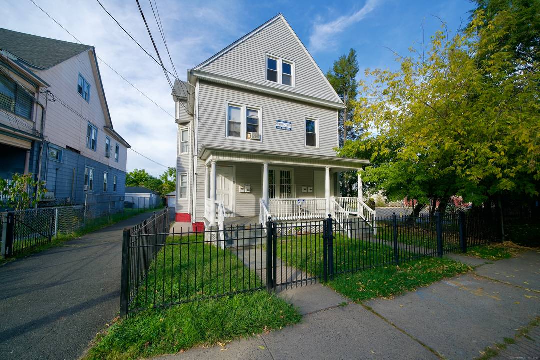 Welcome to this semi renovated three family residence offering modern comfort and exceptional investment potential in Hartford !