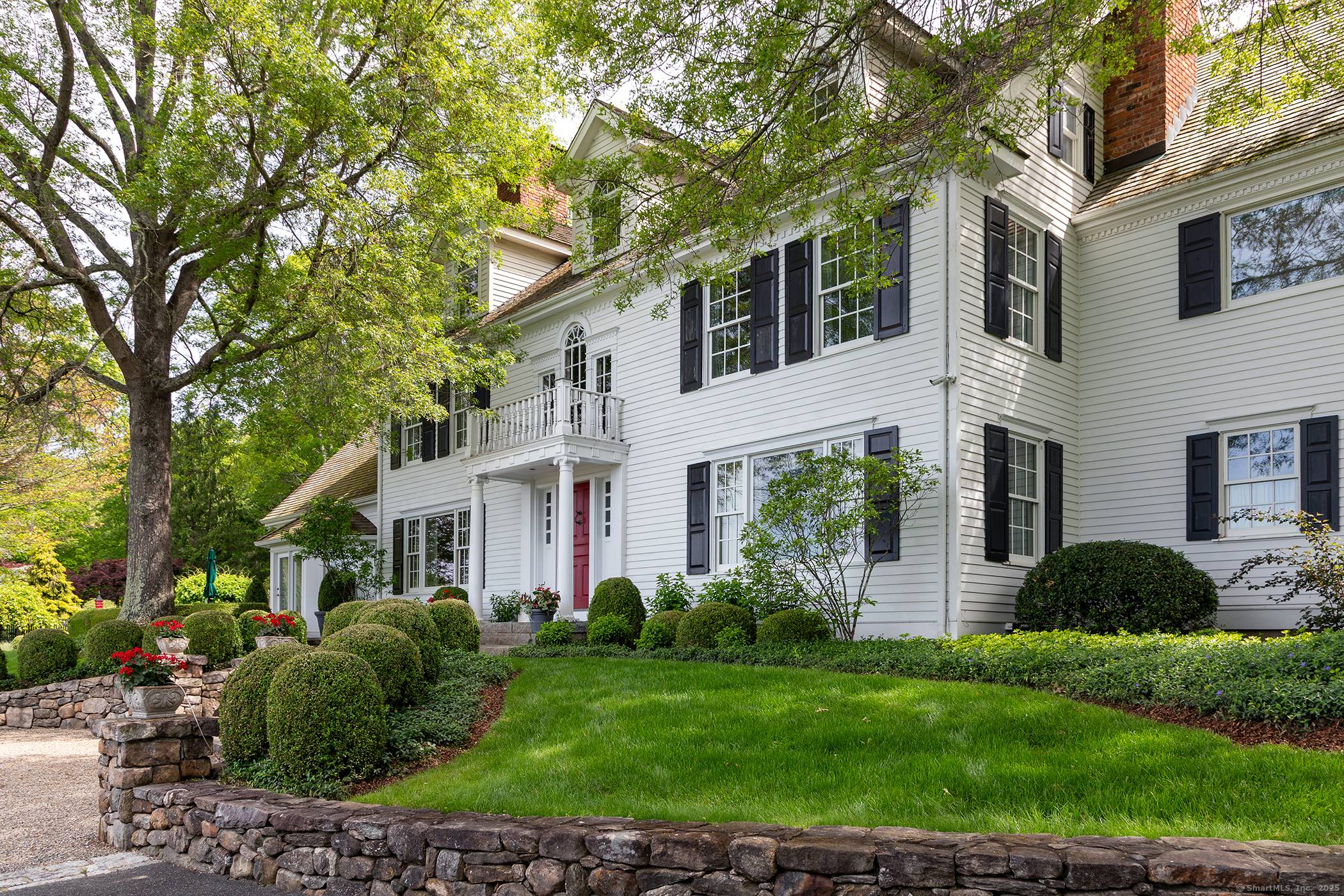 Privately Sited on a Hill in the Midst of 31 acres, this Elegantly Renovated 5, 000 sq ft Colonial Offers Panoramic Sunset Views and Exceptional Privacy.