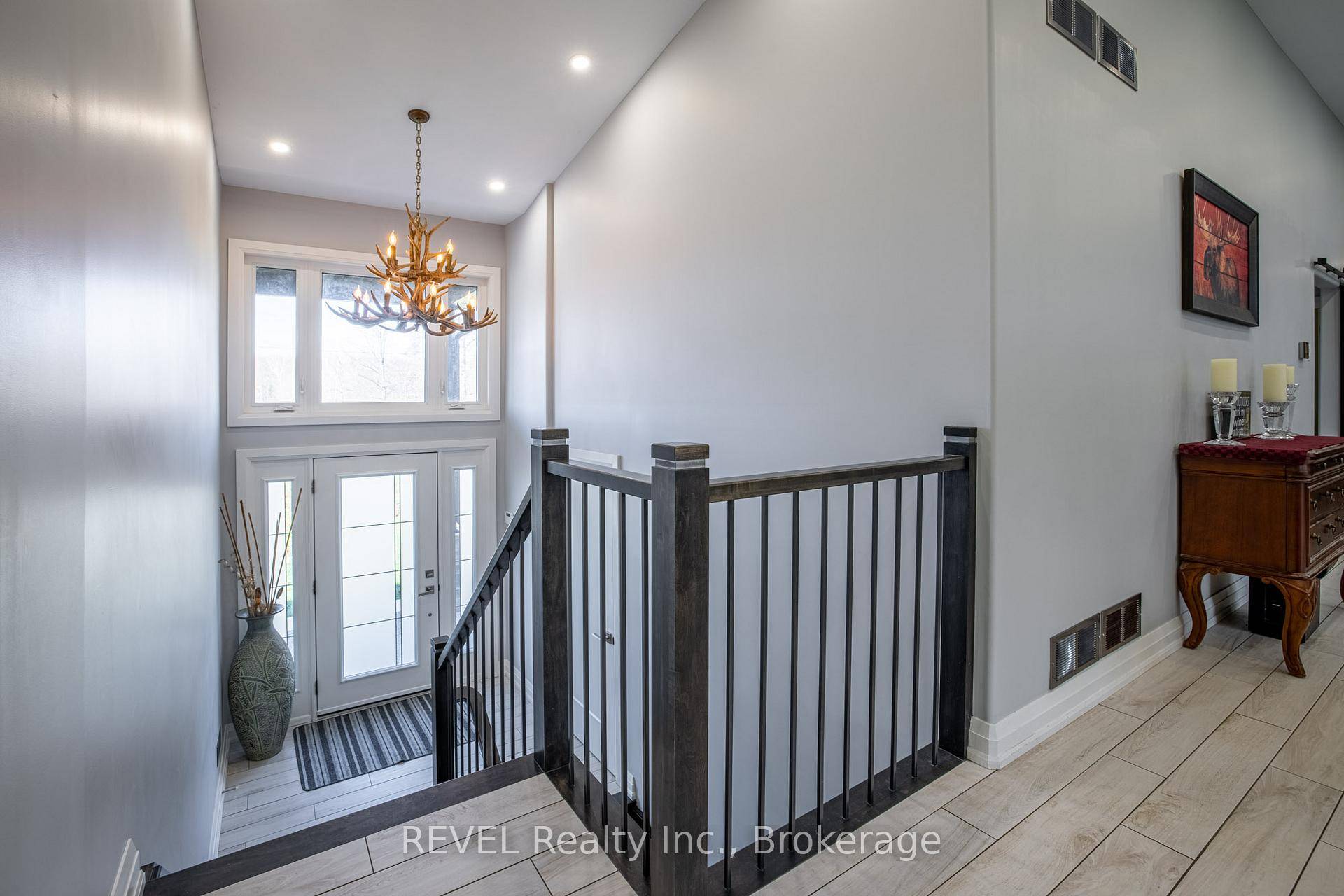 Wainfleet stunner ! This 7 year old raised bungalow situated on 8 acres offers 5 bedrooms and a separate 1 bedroom main floor in law suite, 2 car garage and ...