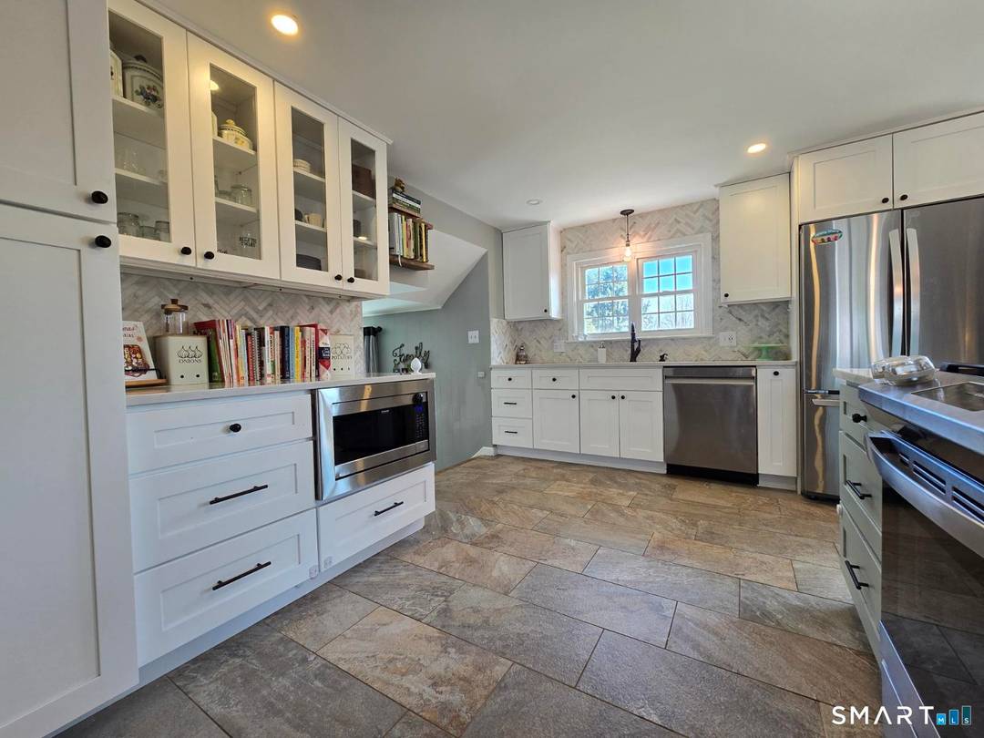 Welcome to this beautifully sun soaked 3 bed, bath and a half home nestled in the heart of Southington.