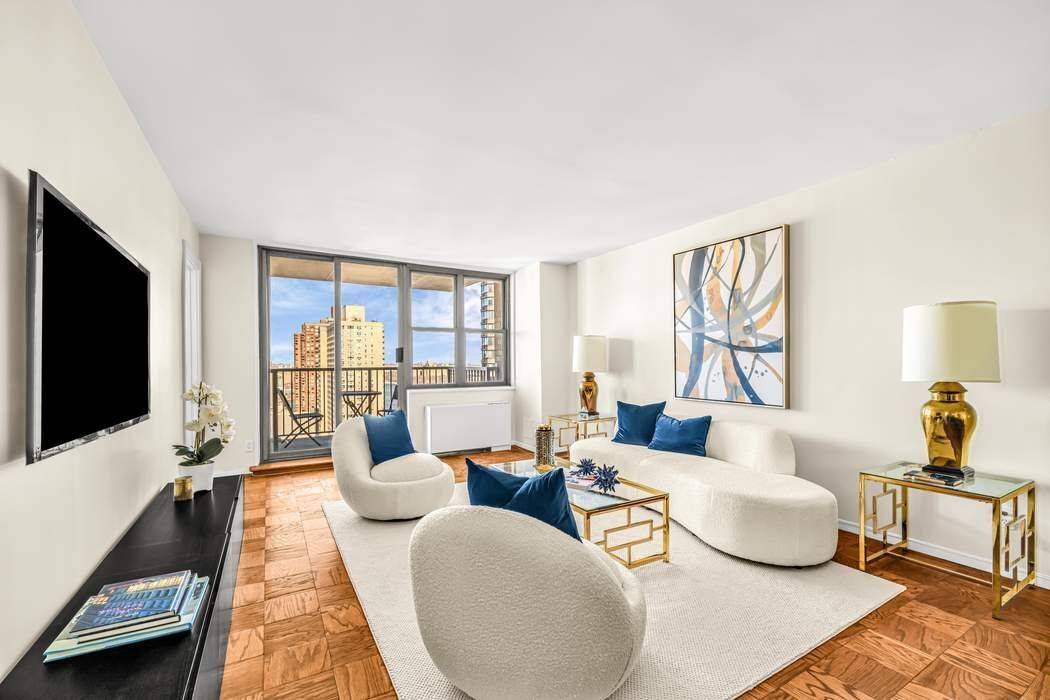 Experience luxurious living in this stunning 27th floor corner apartment.