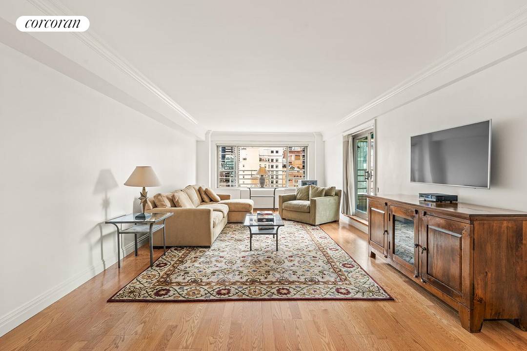 Welcome to your dream home at 200 East 57th Street, Unit 18M With terrace.