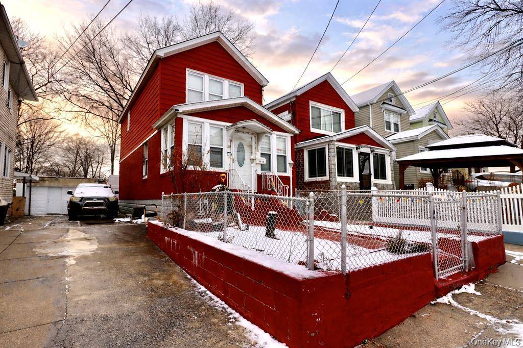 Immaculate detached brick Colonial located in the heart of South Ozone Park.