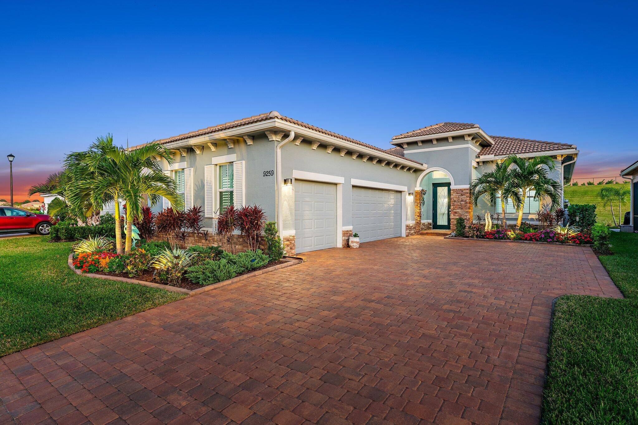 Welcome to 9259 SW Miracoli Way, an exquisite 3 bedroom, 2.