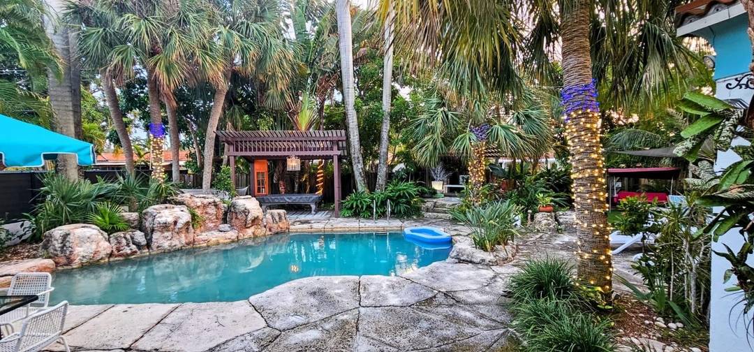 4 Bedrooms 2 Full Bath, with Heated Pool, Hot Tub, impact windows doors, new AC and Roof.
