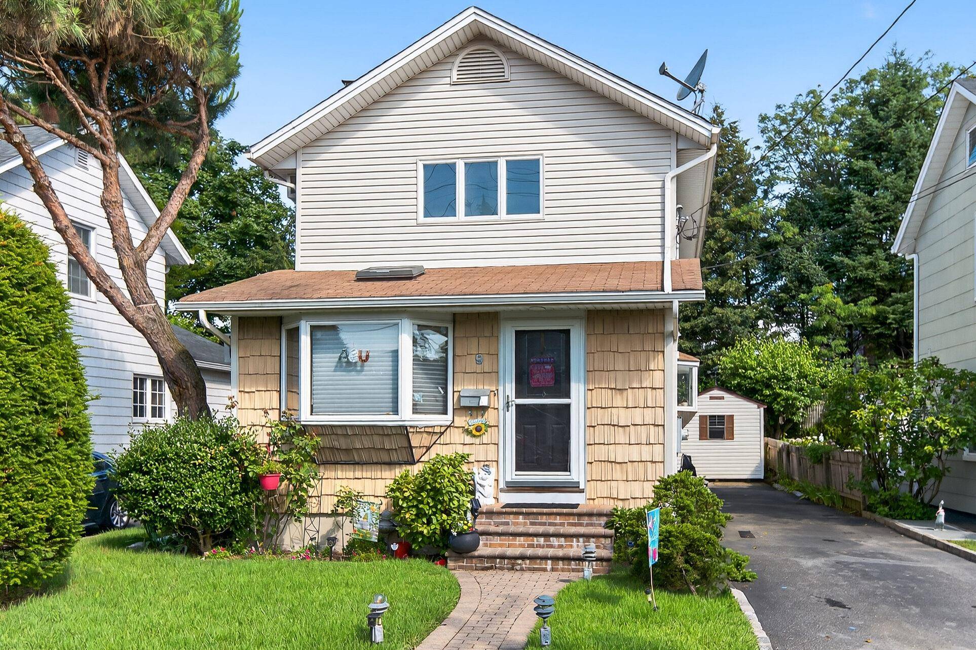Welcome to this vintage three bedroom one and a half bath country charmer that awaits your special touches.