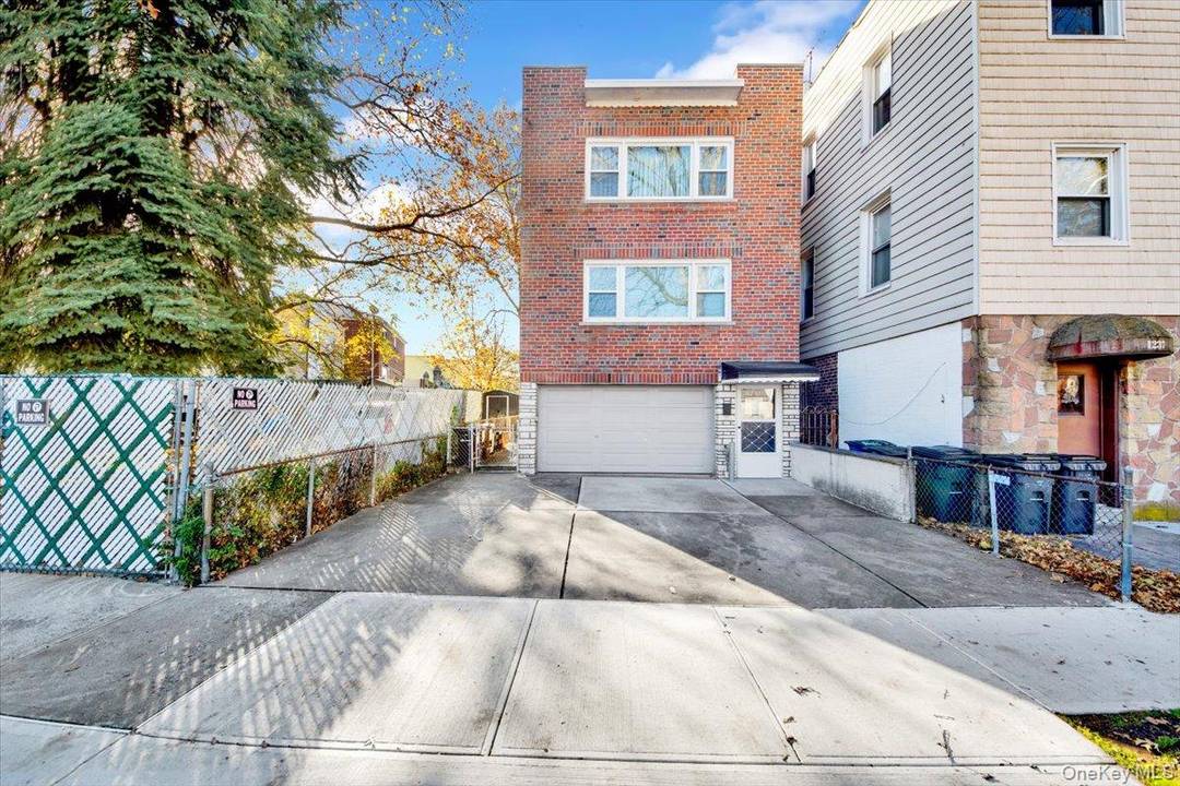 Immaculate, Stately and well maintained two family brick home with finished walk in situated in the desirable Pelham Bay neighborhood available for the first time in 57 years.