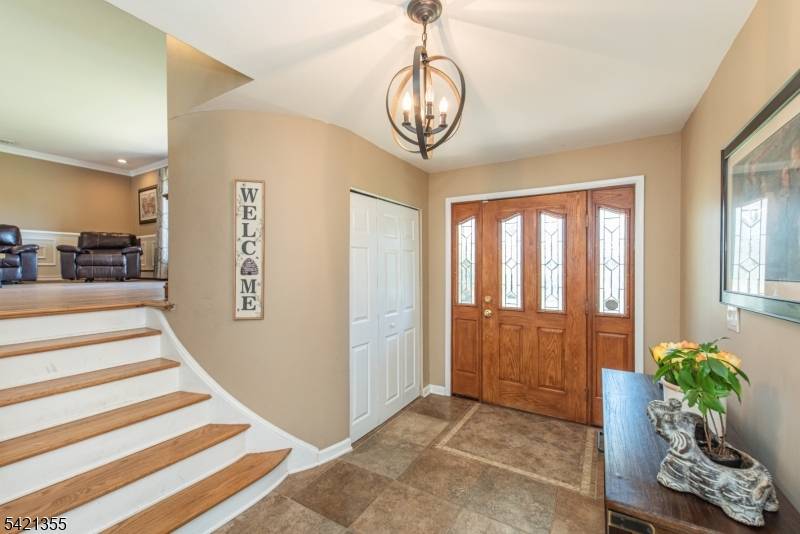 Expanded custom split level home set on a park like 3 4 acre lot features 4 bedrooms, 3 full baths, and an open floor plan designed for comfortable living and ...