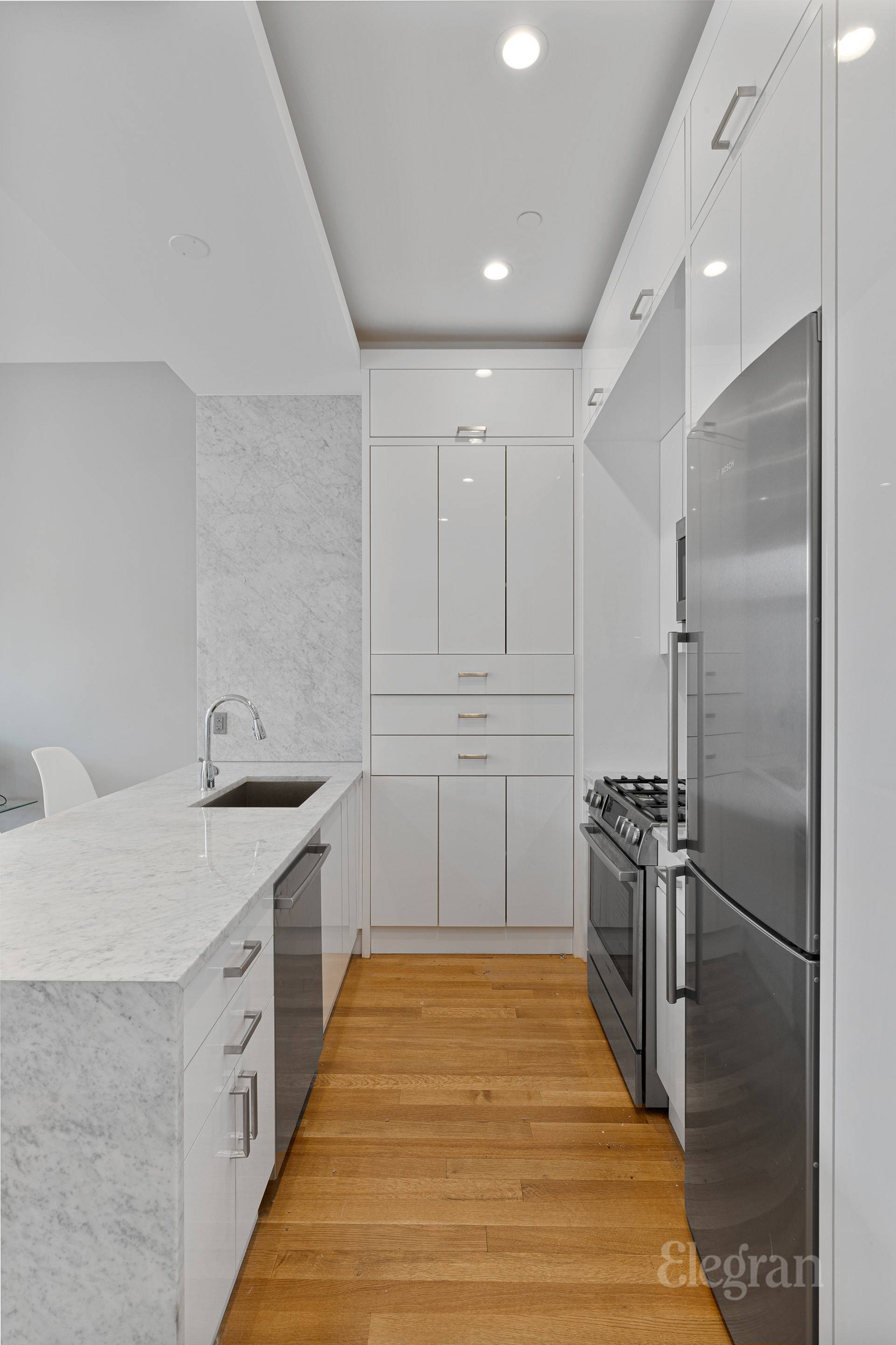 Welcome to your serene sanctuary at Belvedere LXXXVIII, an exclusive boutique condominium with just seven thoughtfully designed residences.