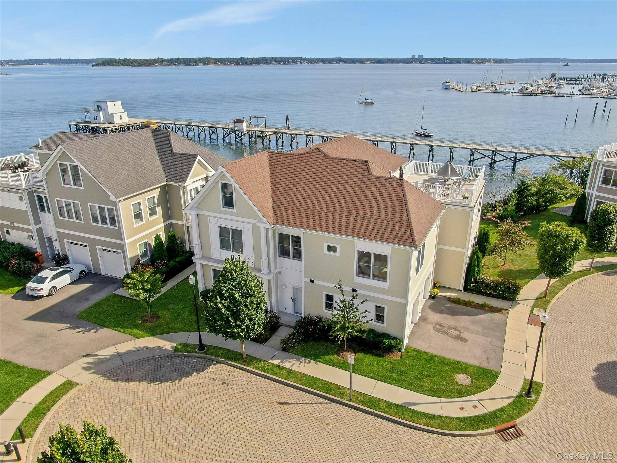 This luxury waterfront home on the Long Island Sound epitomizes elegance and sophistication, offering unparrelled views and a unique living experience.