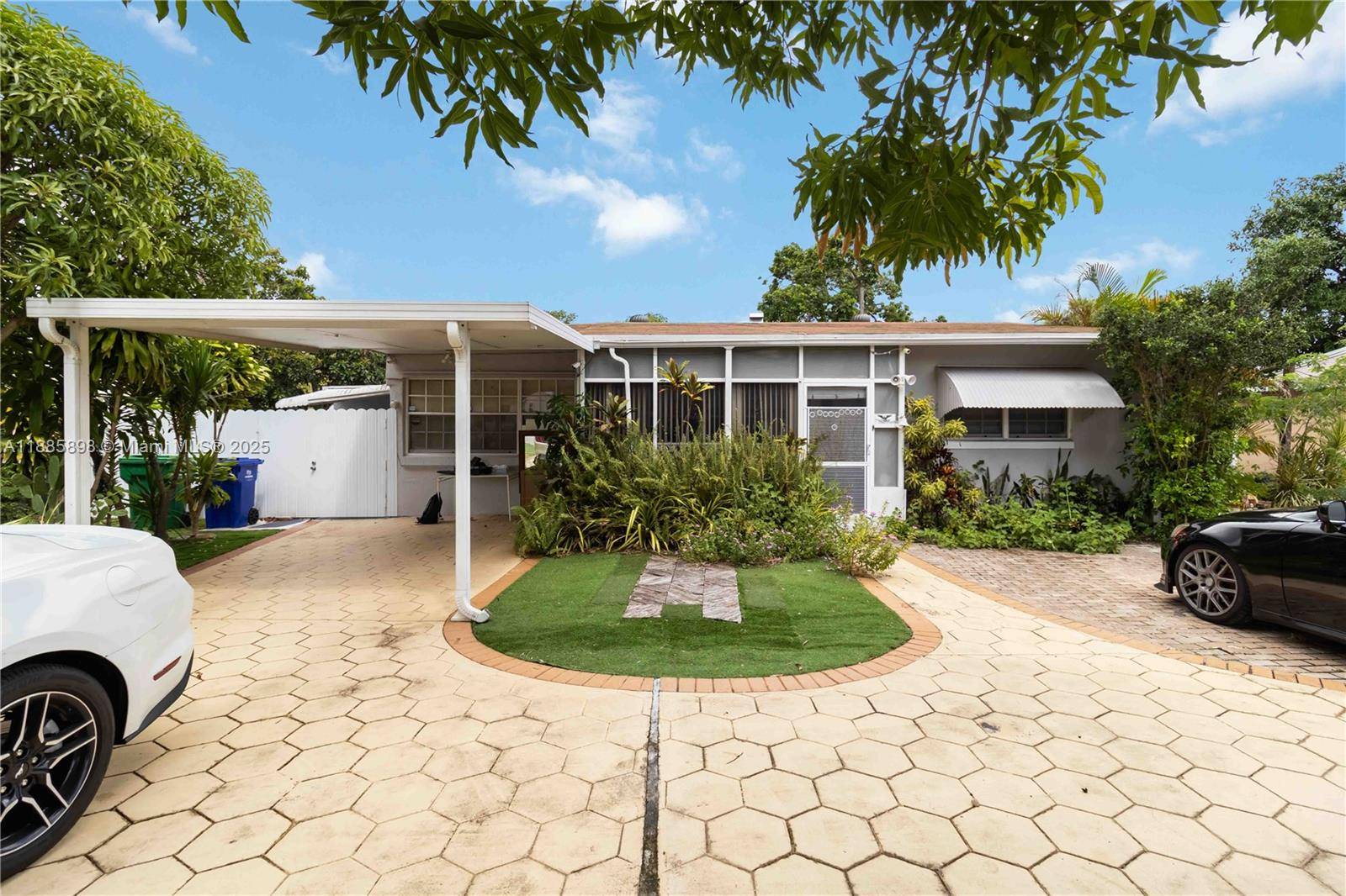 Beautifully updated 2 bedroom, 1 bath home with den and office in the heart of Miramar !