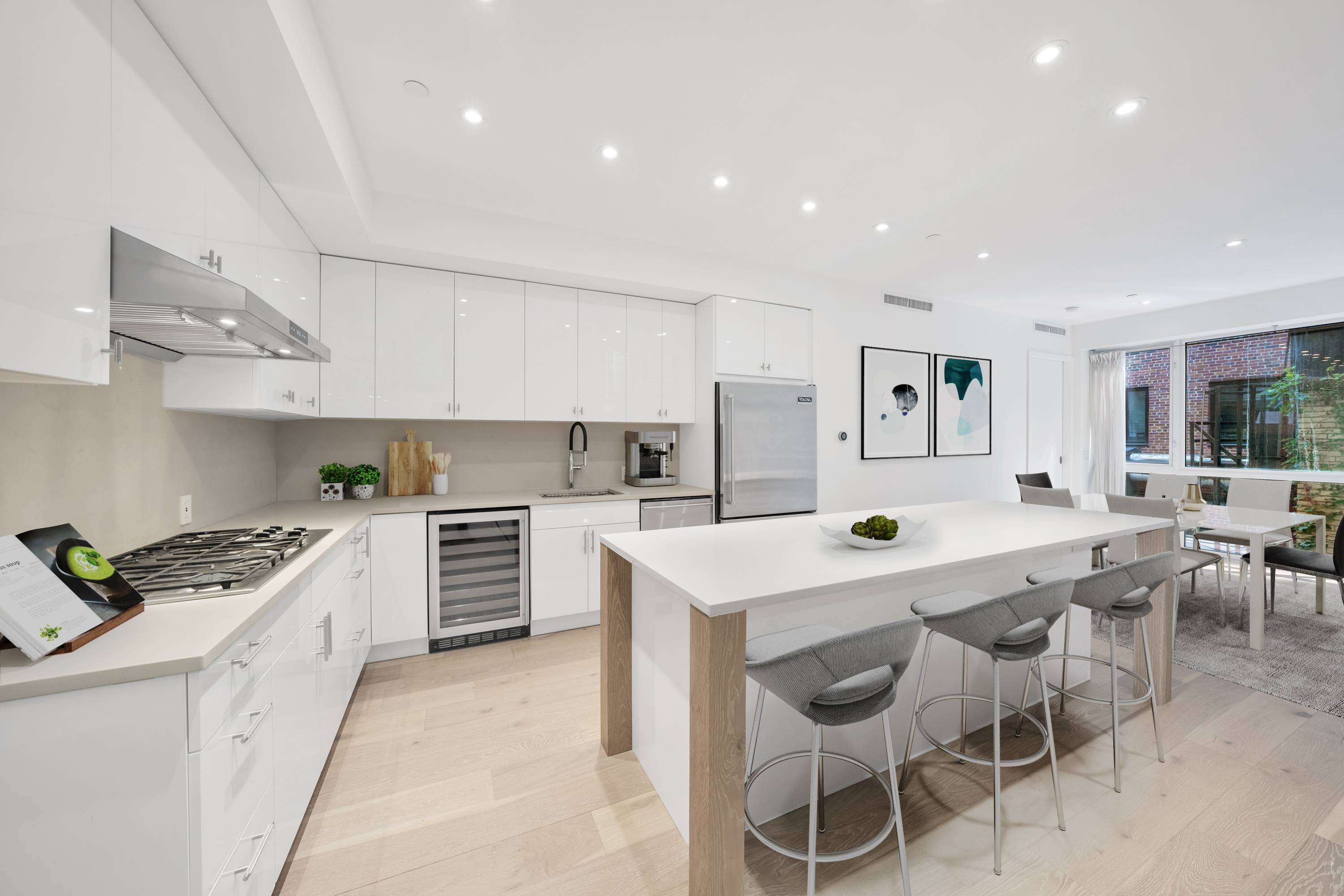 NEWLY RENOVATED ! ! Luxury Village loft living in a boutique landmark condo building.