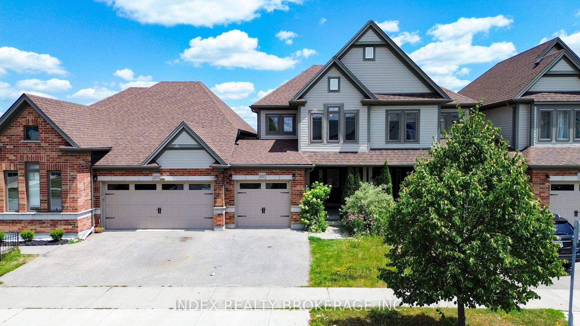 Immaculate Freehold No POTL Fee Townhouse in Desirable Grand River South !