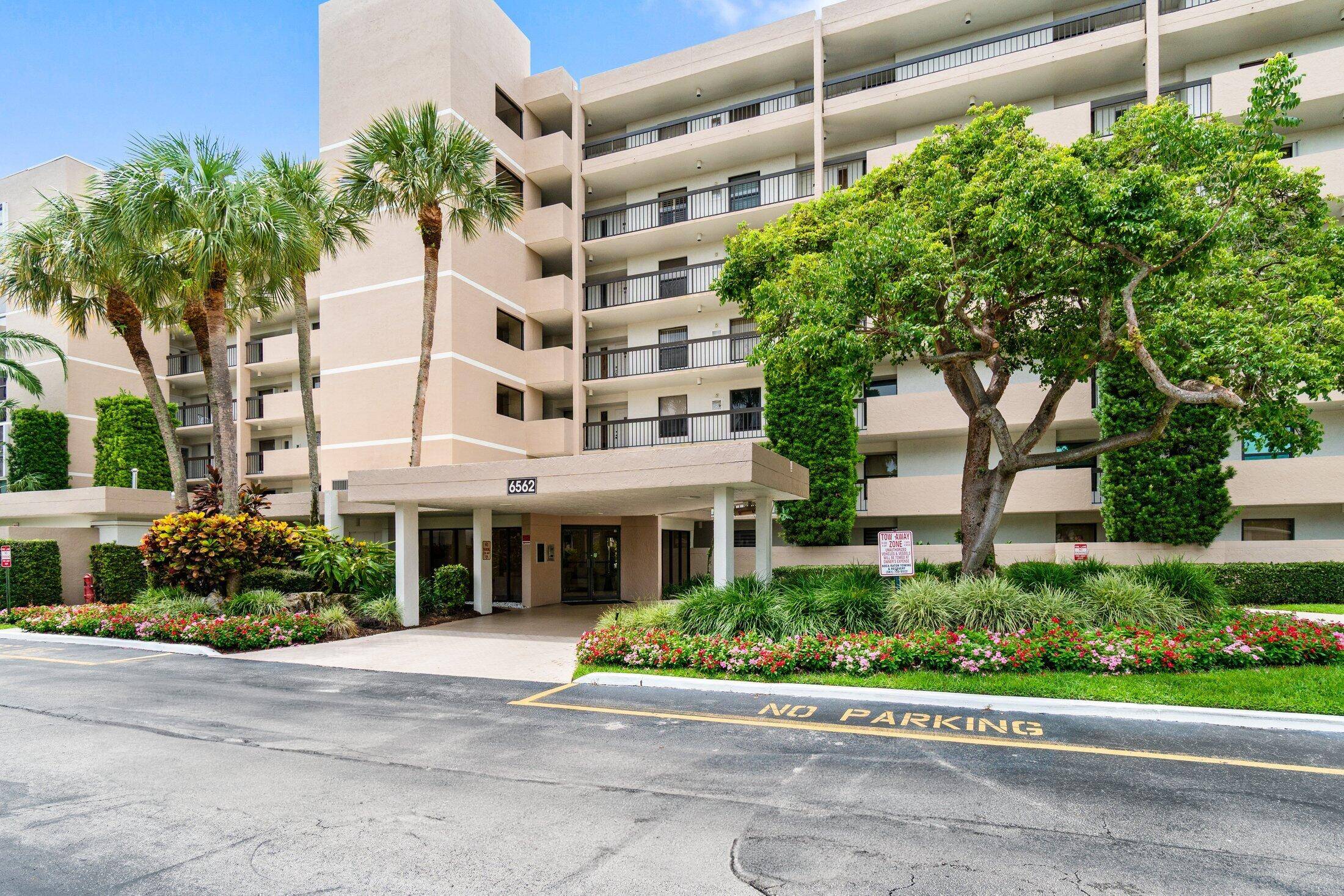 Beautifully renovated home with an amazing lake and golf view in Central Boca Raton.