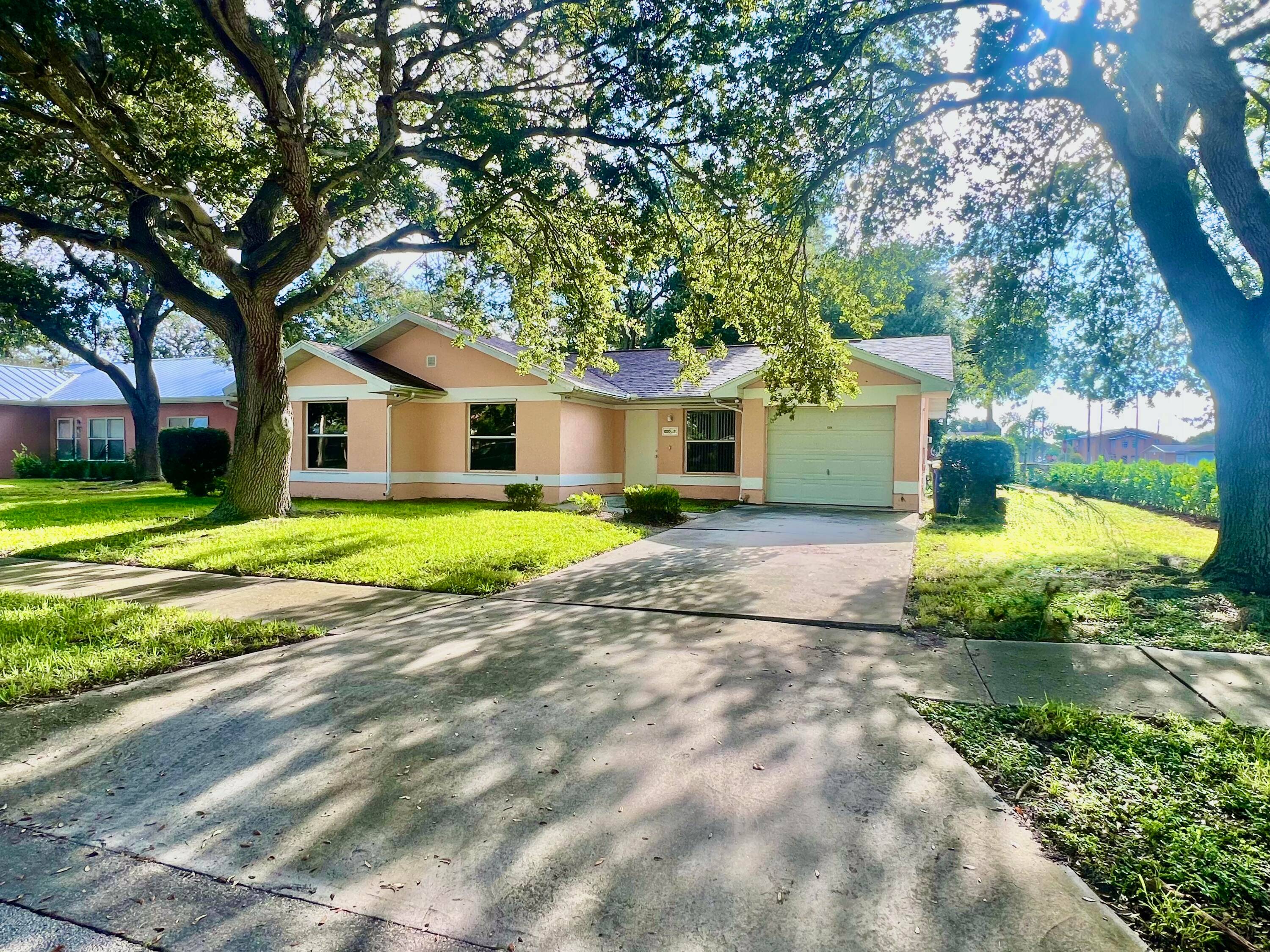 Home for Sale in Palm Walk Community 127796 ; Don't miss this well kept 3 bedroom, 2 bath home 1 Car Garage Featuring a spacious open floor plan, updated flooring, ...