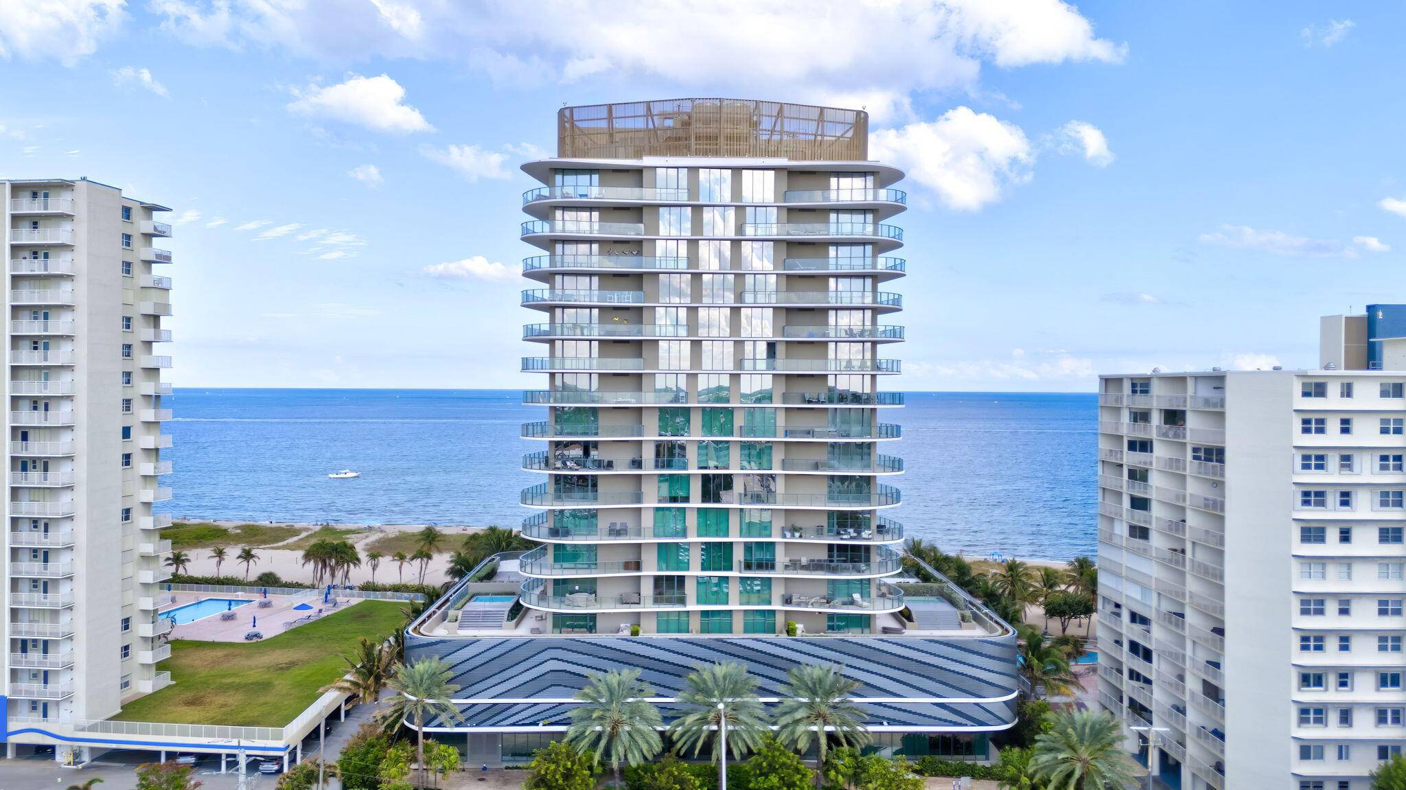 OCEANFRONT PENTHOUSE CORNER UNIT W SOARING 10 FT CEILINGS.