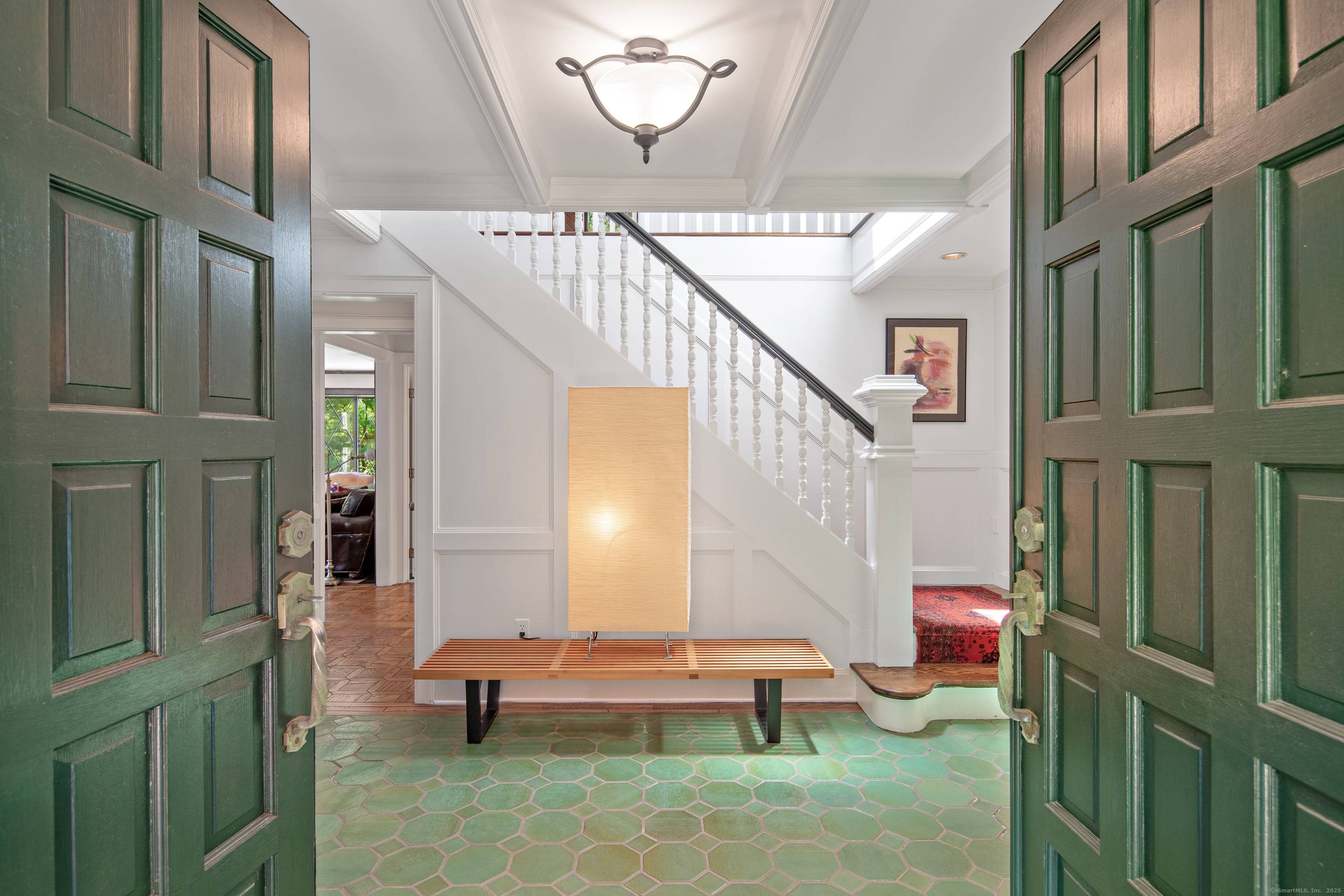 This magical 4, 000 square foot English Tudor with its loft library overlooking the 35' great room featuring a soaring stone fireplace is perfect for weekend escapes from the big ...