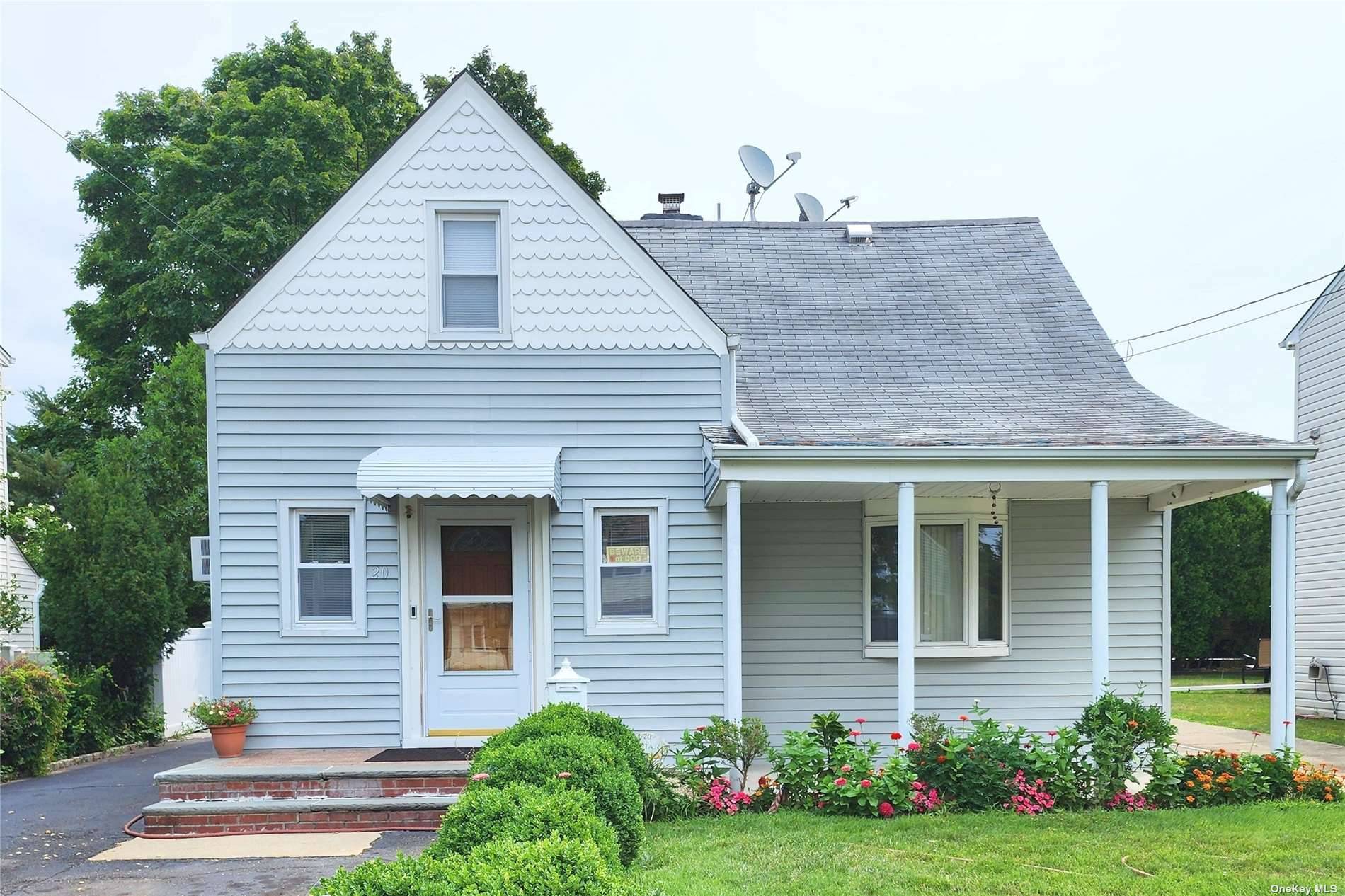 Nestled in the central hub of New Hyde Park, amidst the esteemed Herricks School District, this captivating cape residence presents an unparalleled blend of practicality and convenience.