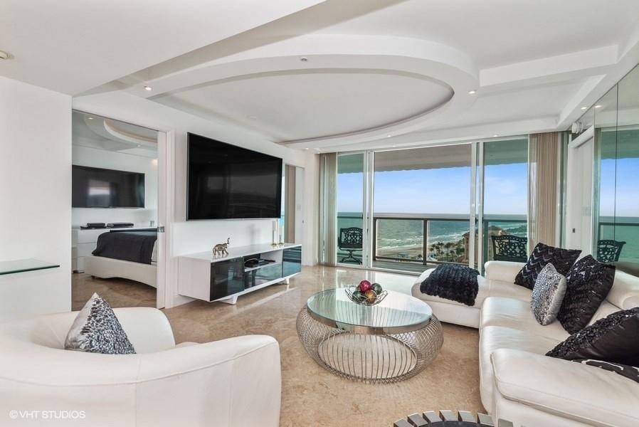 COME TO PARADISE ! Stunning 18th floor penthouse with southeast exposure and breathtaking ocean views from every room.