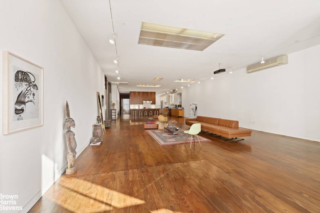 Owning this income producing co op loft is an investment opportunity that does not come along often.