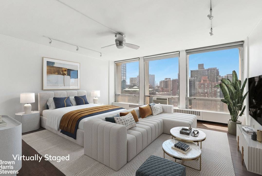 Bright, oversized alcove studio perched on a high floor at Kips Bay Towers, offering open city views and great natural light throughout the day.