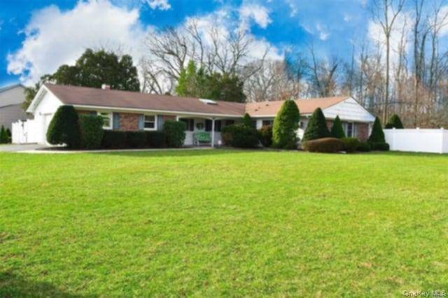 Stunning 3 Bedroom, 2 Full bath and large living room Ranch house situated on a dead end large corner property.