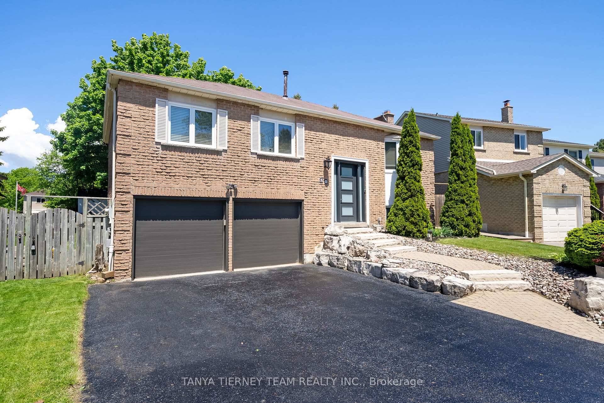 Immaculate amp ; updated 3 1 bedroom raised bungalow nestled on a premium treed lot !