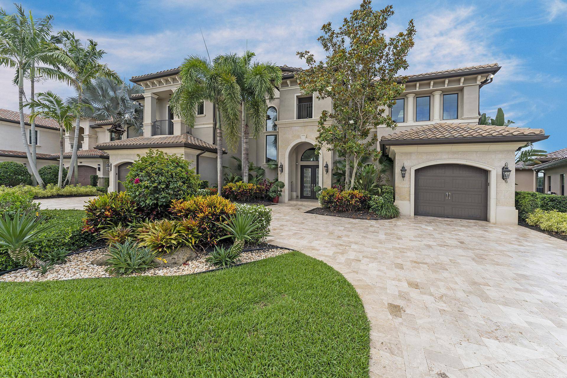 Beautiful Chantilly model home with custom finishes on one of the finest water lots in The Bridges.