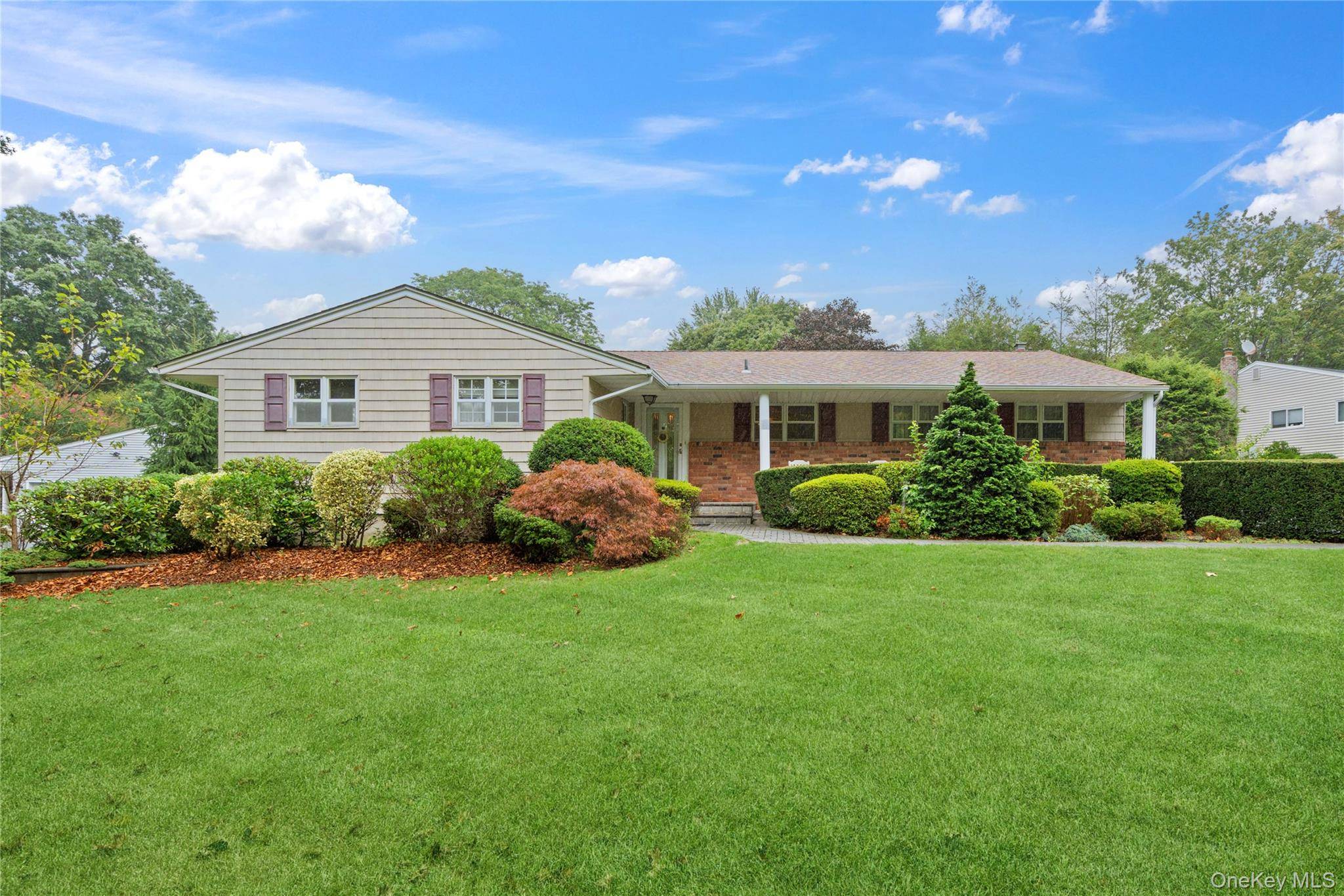 Welcome to this lovingly cared for 4 bedroom, 2 bath ranch in the highly sought after Harborfields School District.