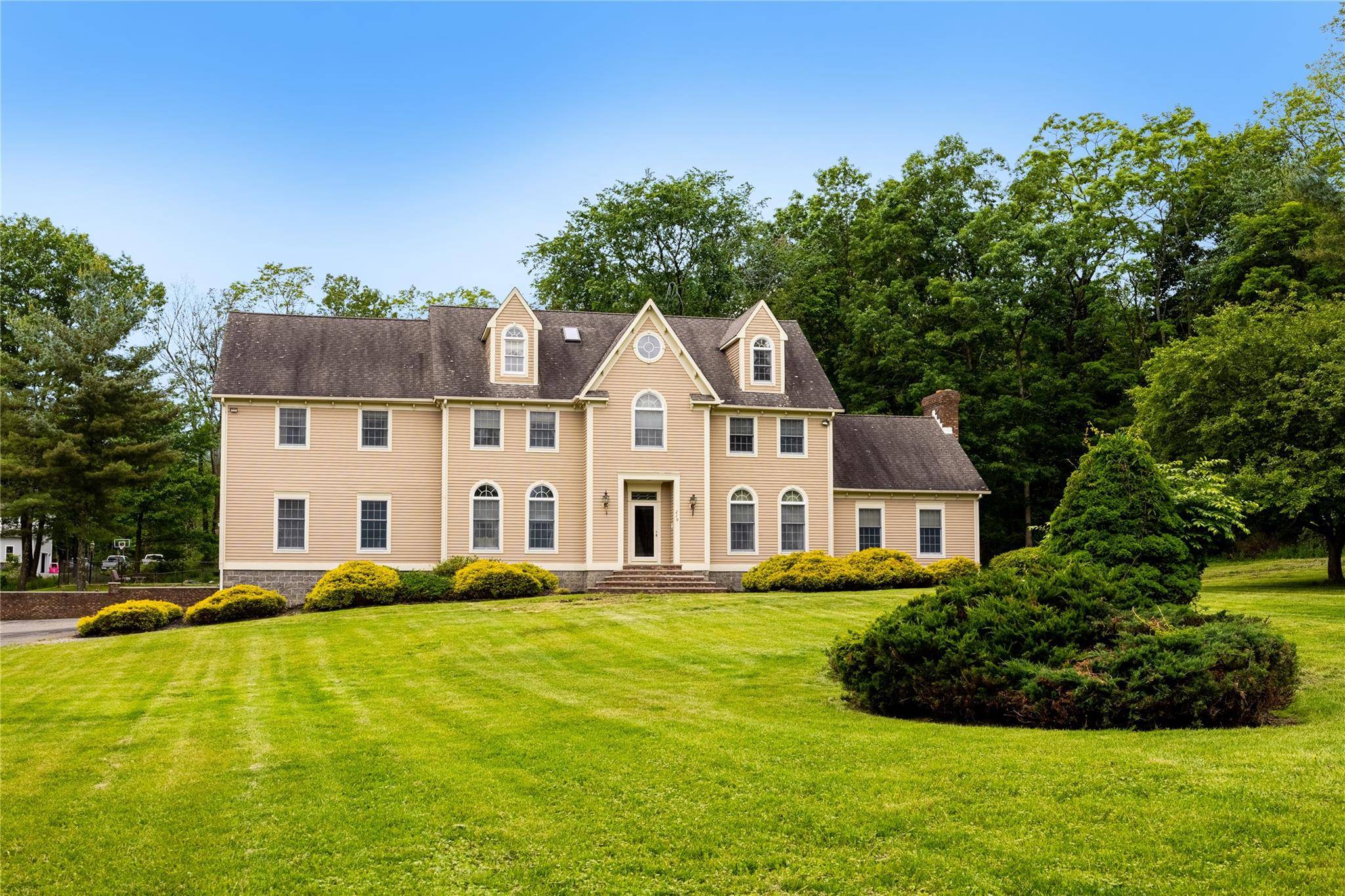 Nestled atop nearly 2 acres of park like property, this 6 Bedroom 4.