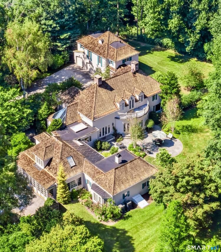 Privately sited in the heart of Greenfield Hill, this updated home blends European inspired architecture with the modern comforts today's luxury buyers value most.