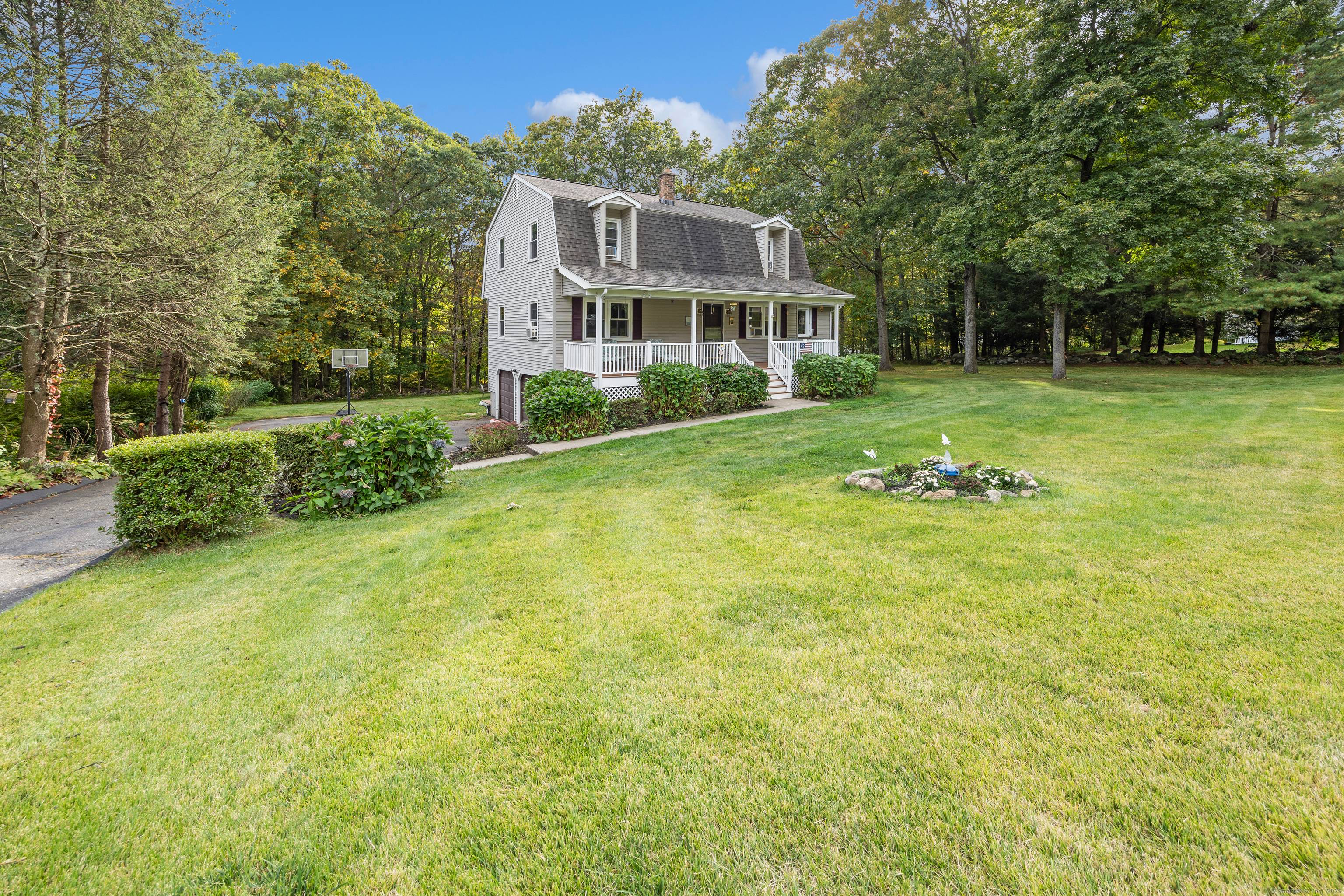 Welcome to this inviting Gambrel Colonial, perfectly set on a quiet cul de sac in Prospect.