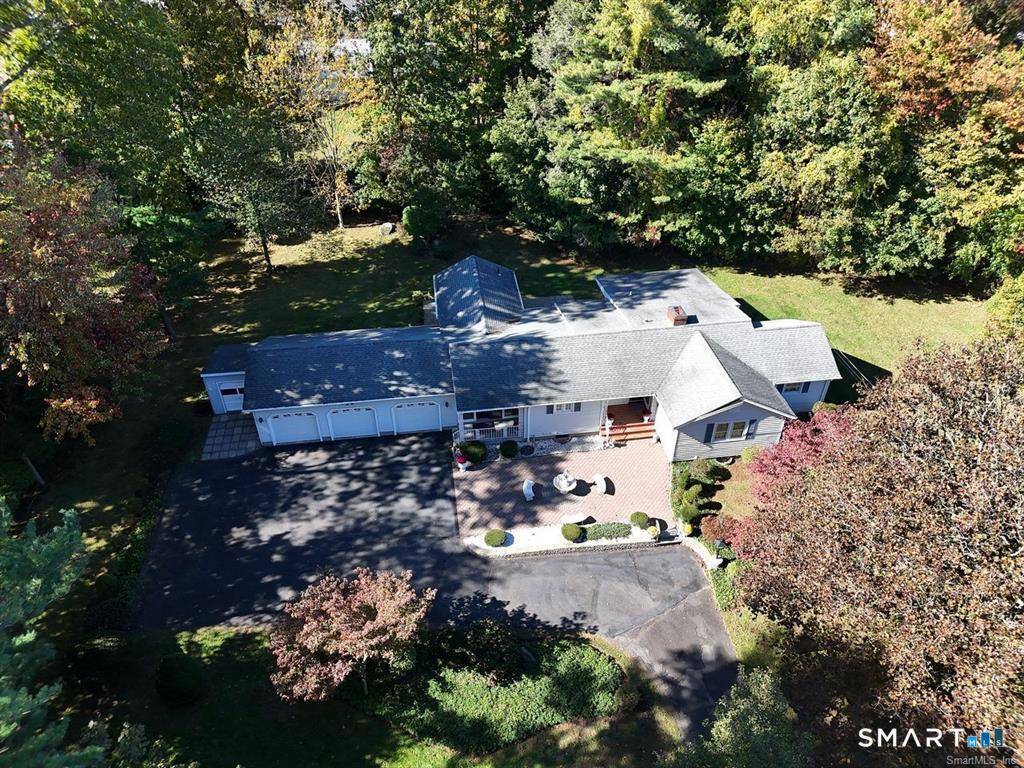 Set on a rare, level 1. 03 acre lot in a peaceful rear setting, this often admired sprawling Ranch offers exceptional curb appeal ease of true 1 level living.