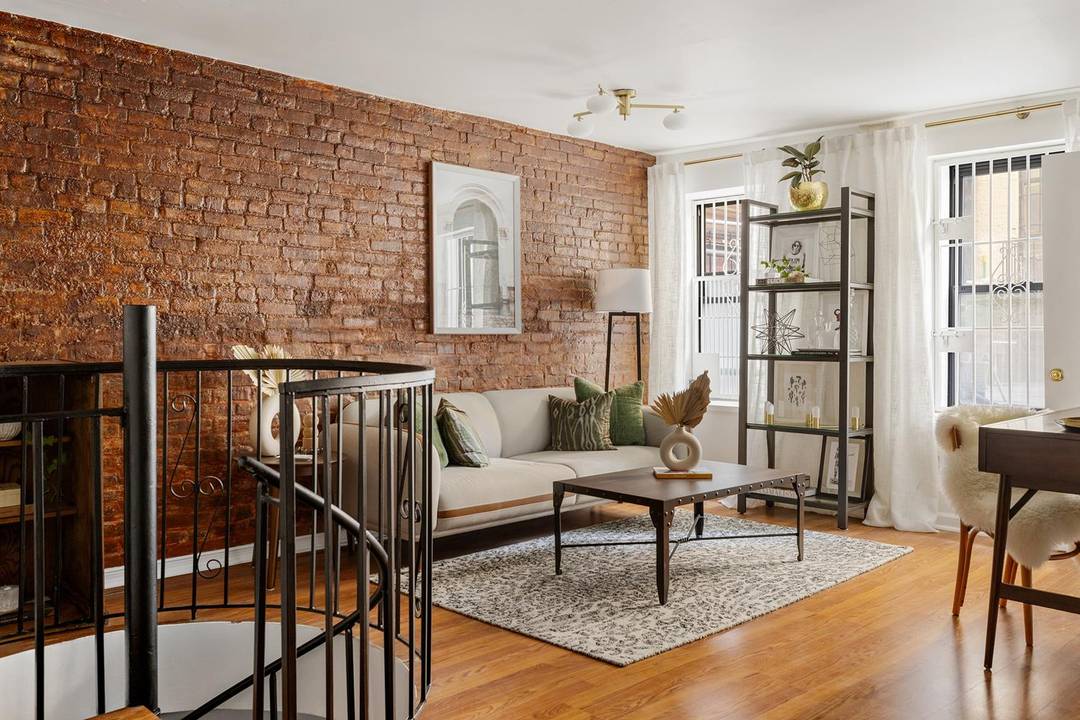 Downtown character meets modern functionality in this quiet duplex retreat in the heart of the Lower East Side.