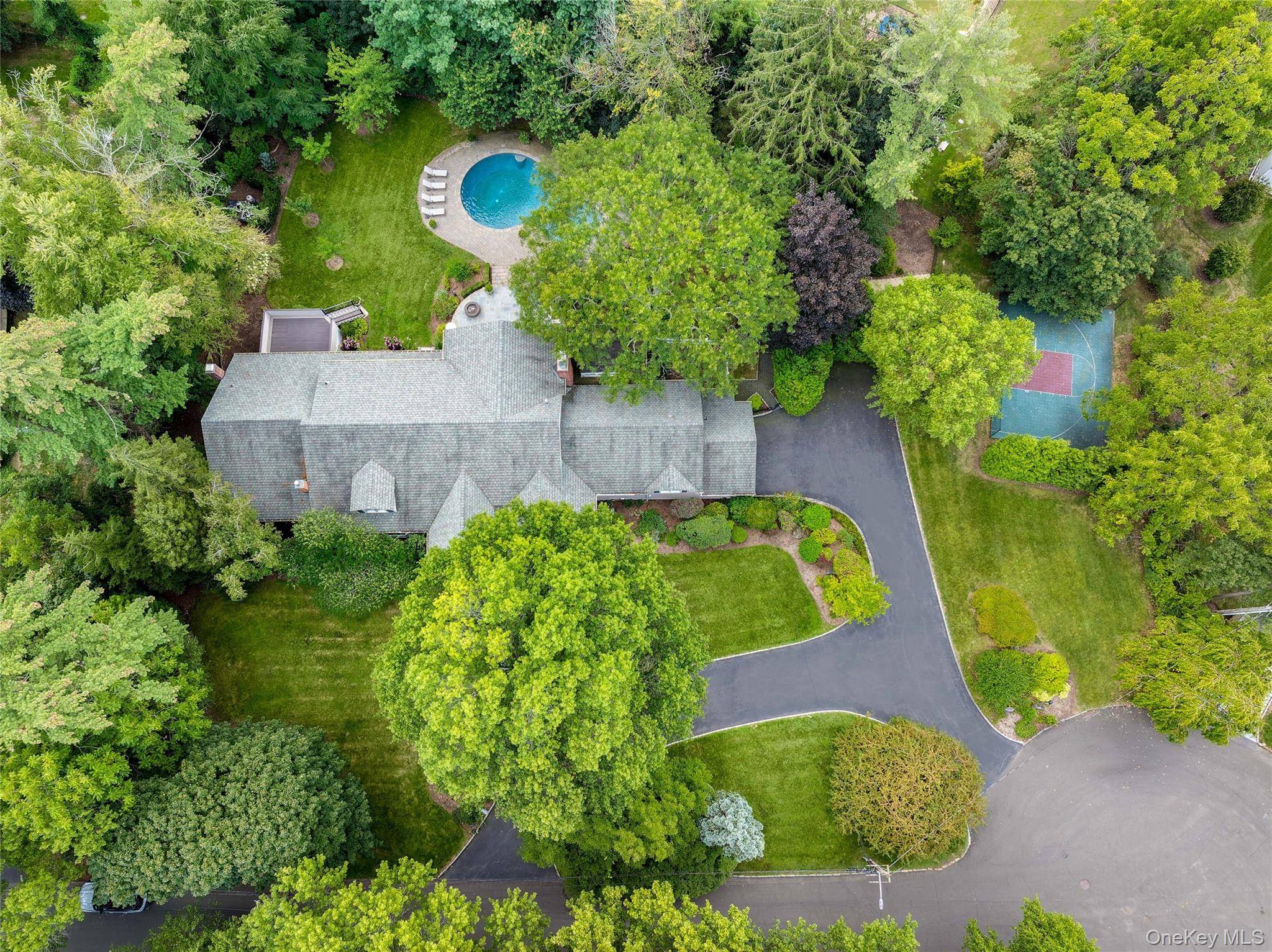 Nestled on a serene double cul de sac, this sprawling ranch sits on just over an acre, offering the perfect blend of privacy, space, and sophistication.