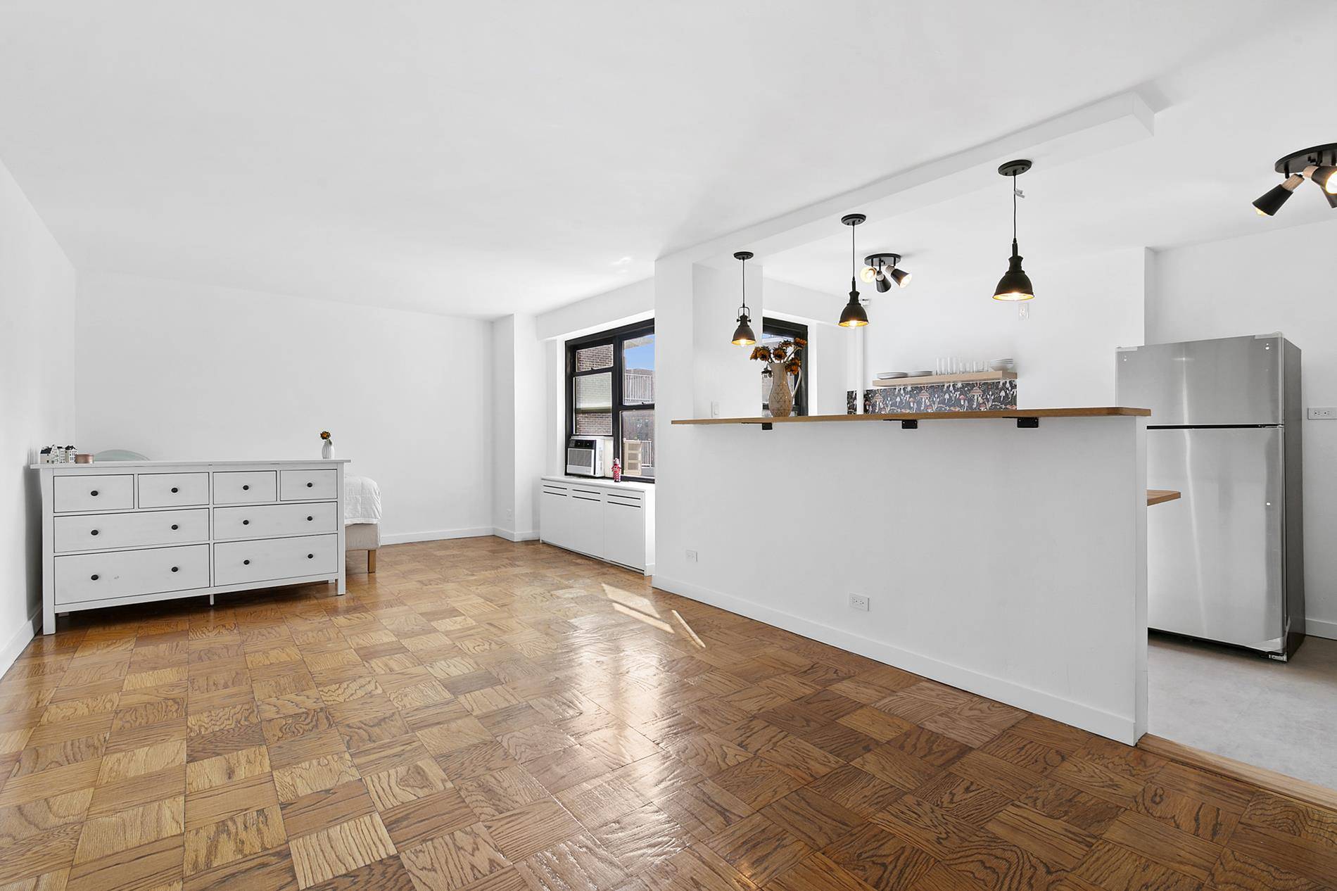 Welcome to your newly updated light filled studio apartment.