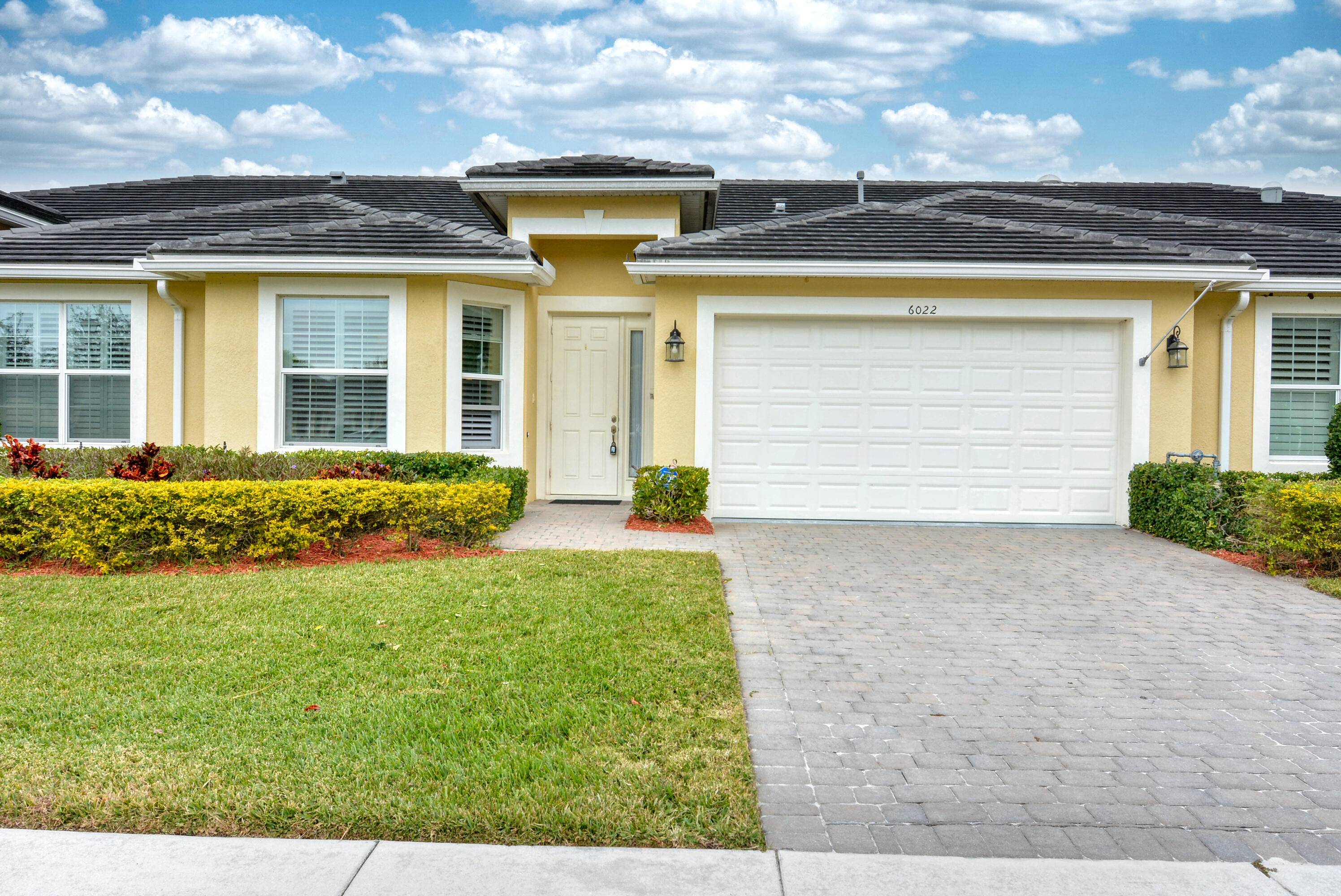 Spacious 2 Bedroom Townhome with Bonus Room in a Gated Community !