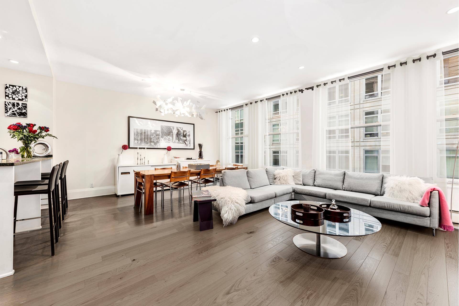 Beautiful, thoughtfully designed 2 bedroom 2 bath downtown loft jewel at the elegant prewar Fulton Chambers, a boutique condominium in the heart of the Financial District.