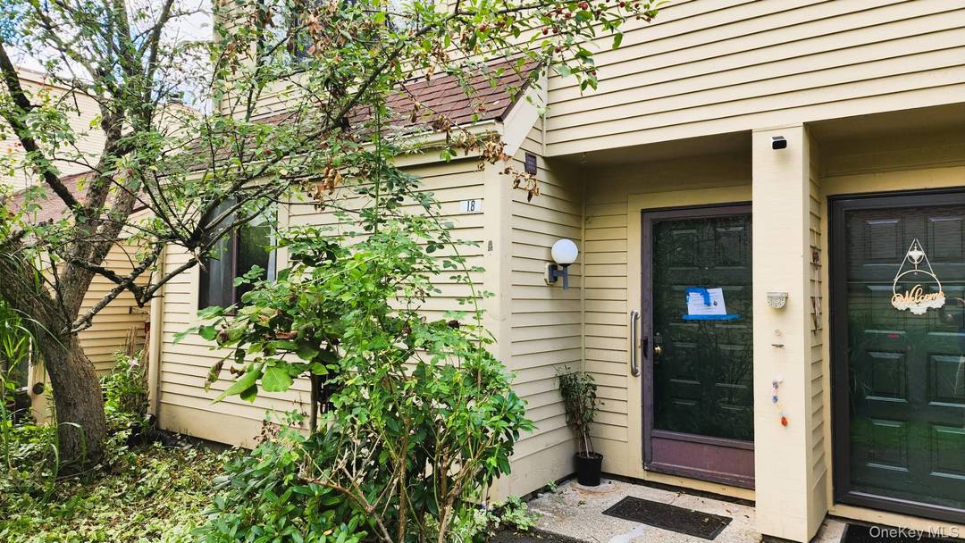Tri level townhome with two bedrooms plus a loft in Oakridge.