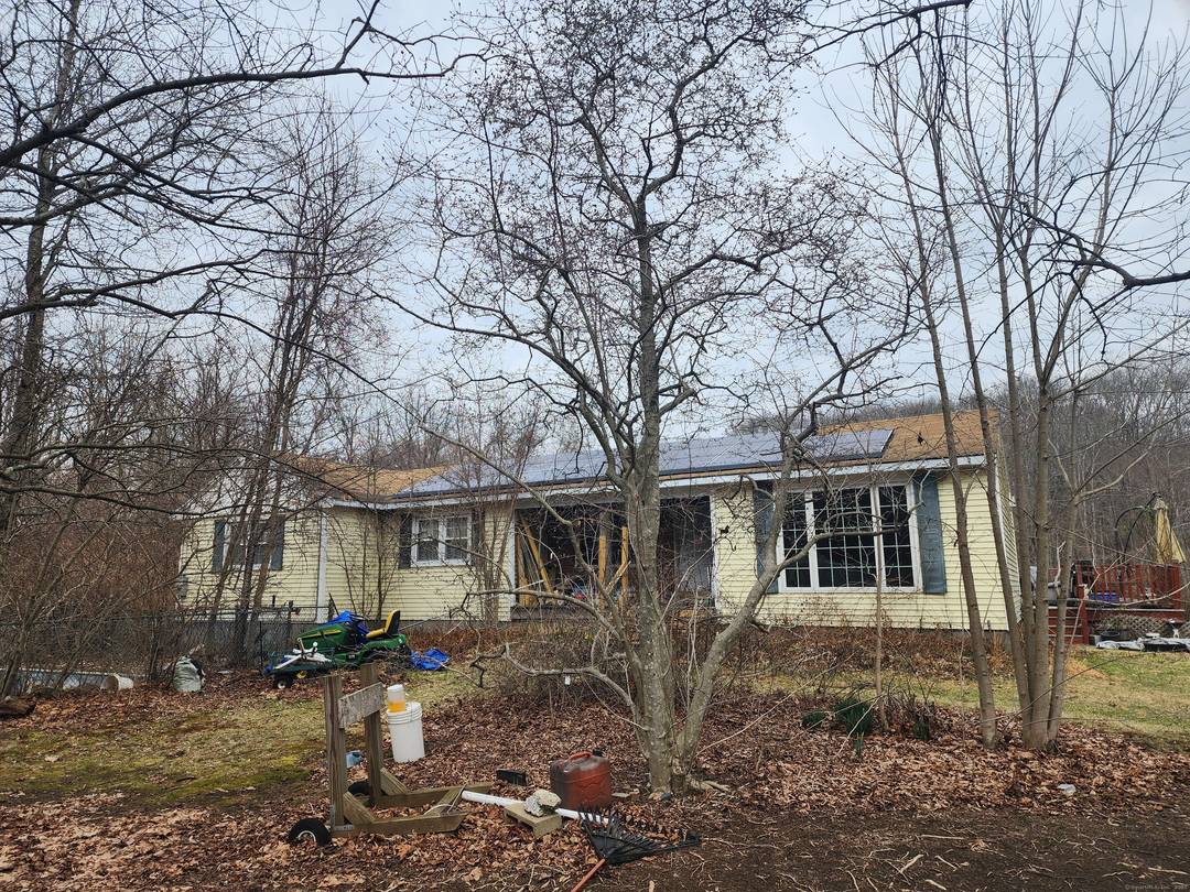 3 Bedroom, 1. 5 Bathroom Ranch with solar panels and 2 sheds.